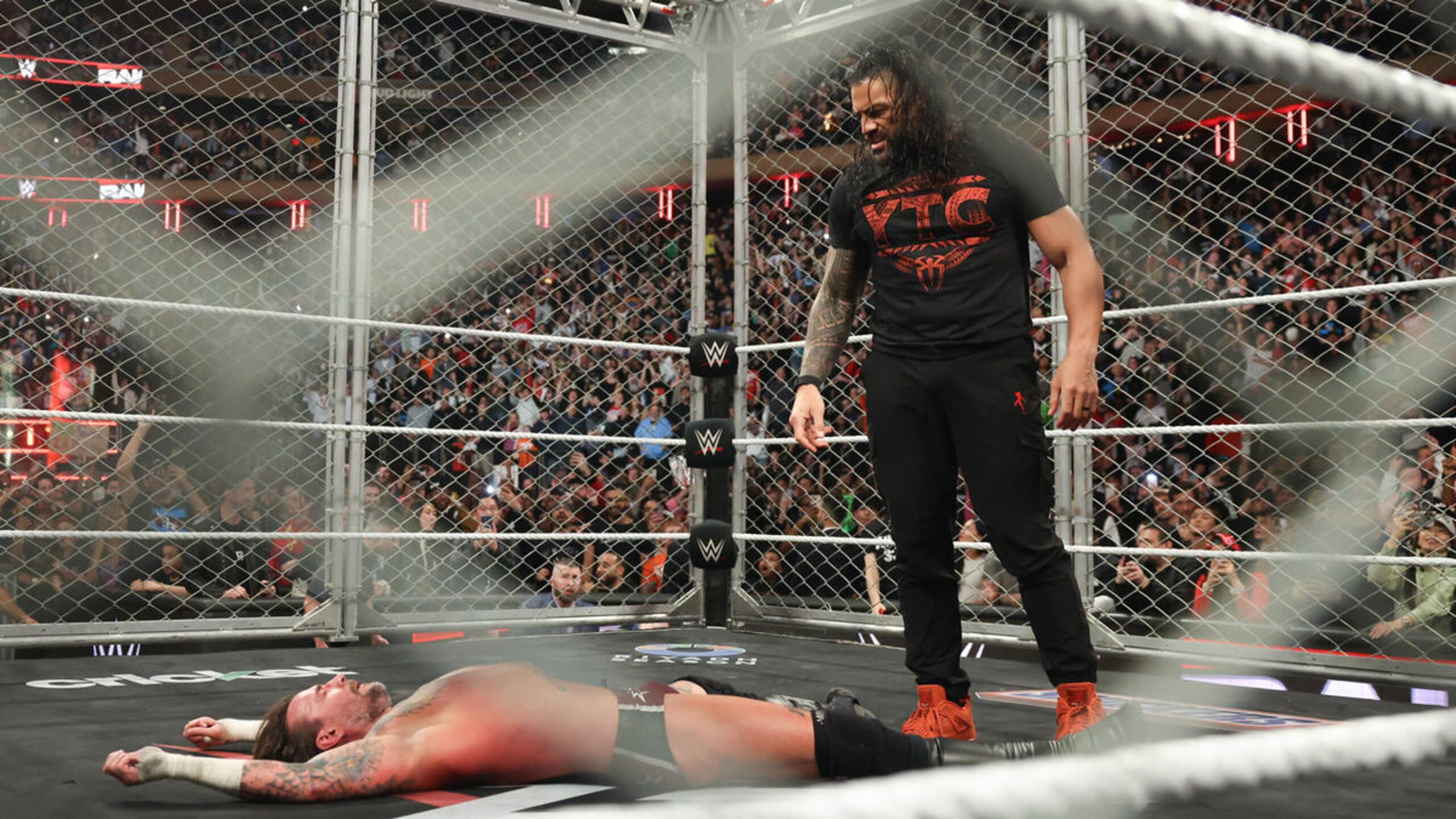 Roman Reigns returned to attack CM Punk and Seth Rollins.