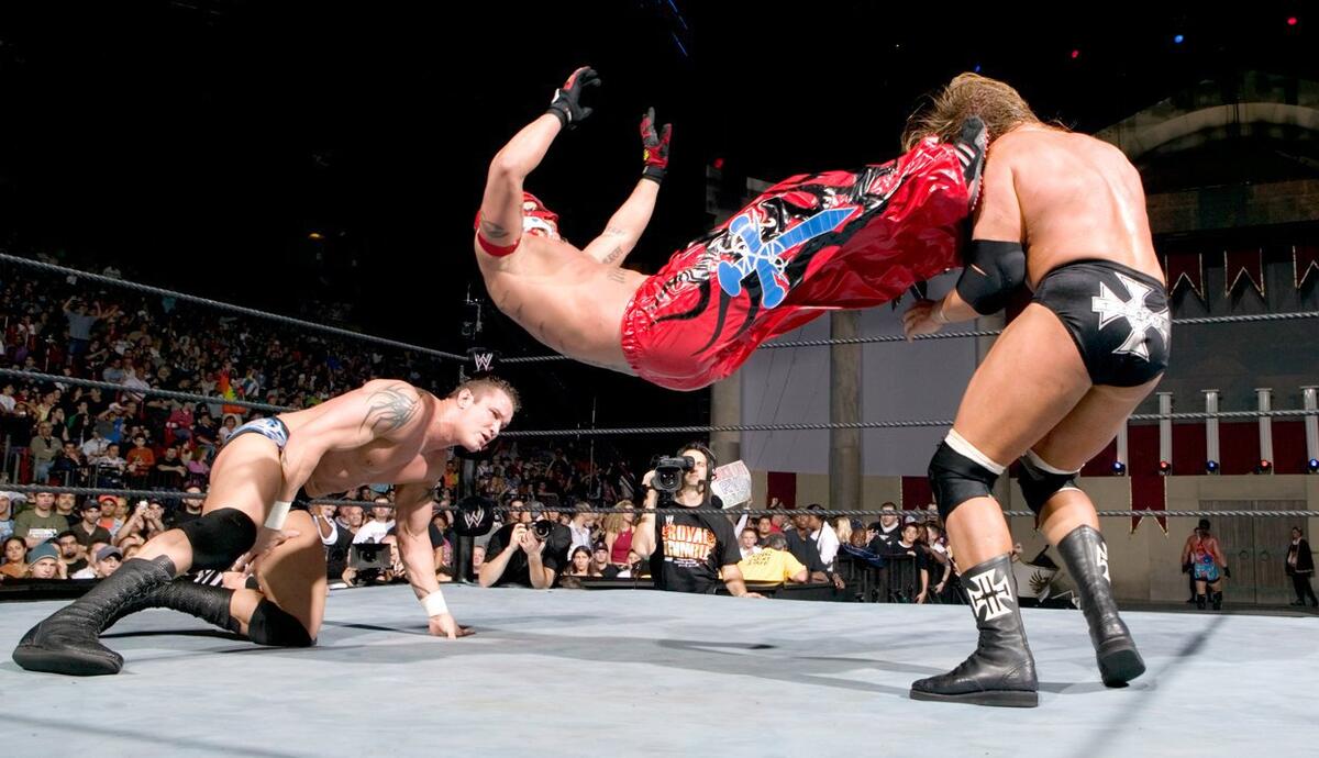 Rey Mysterio, Triple H, and Randy Orton in the 2006 WWE Royal Rumble Match