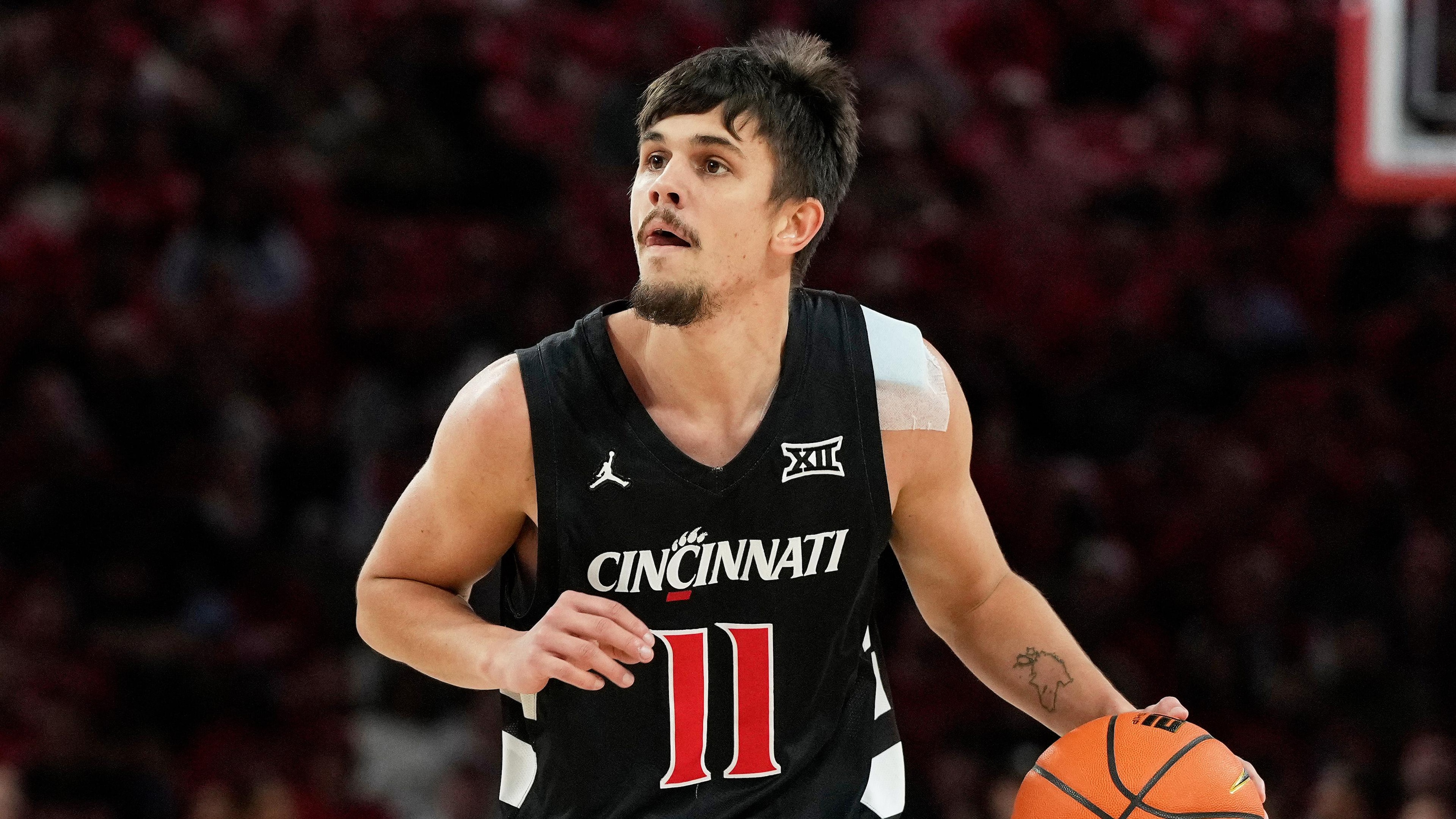 Former Basketball Player Charged