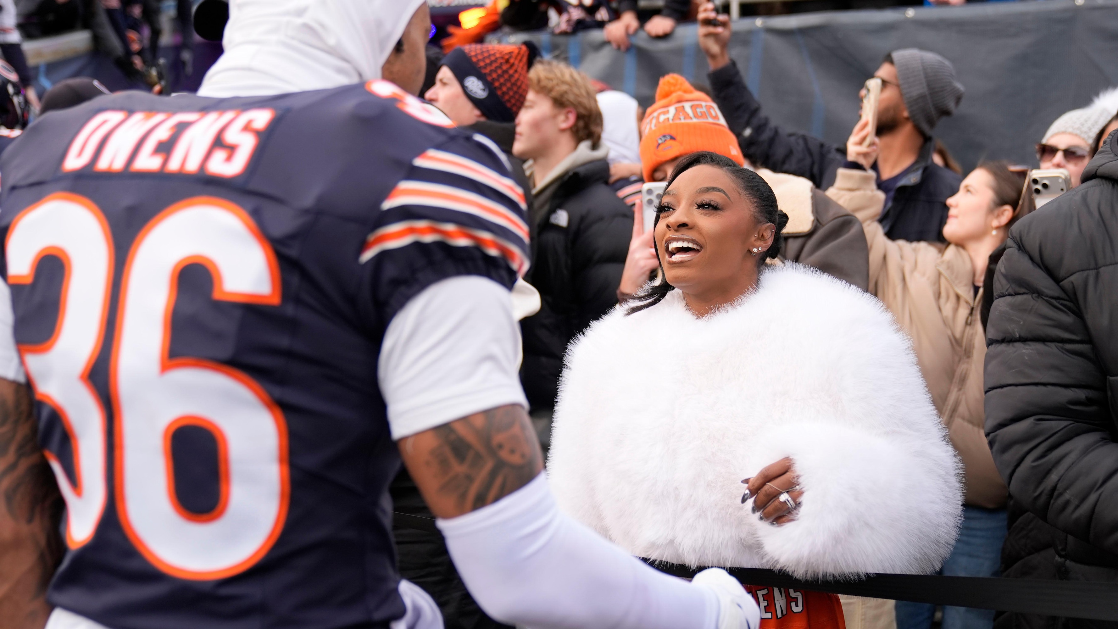 Simone Biles Supports Husband Jonathan Owens with Custom Jacket at Rams vs. Bears NFL Playoff Game