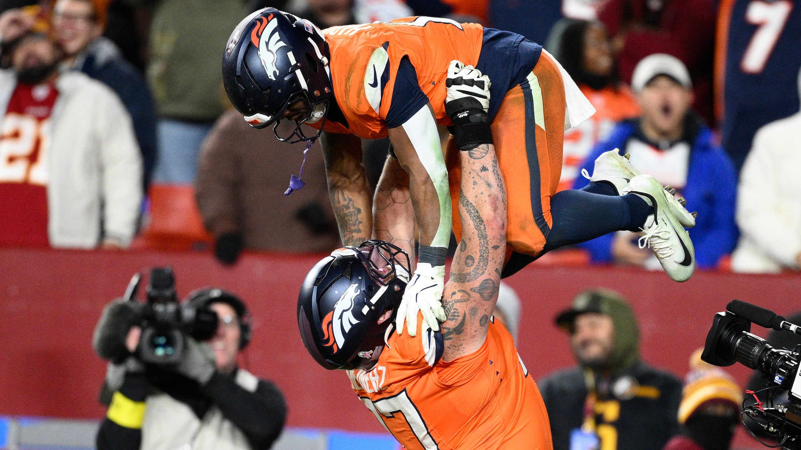 APTOPIX Broncos Commanders Football