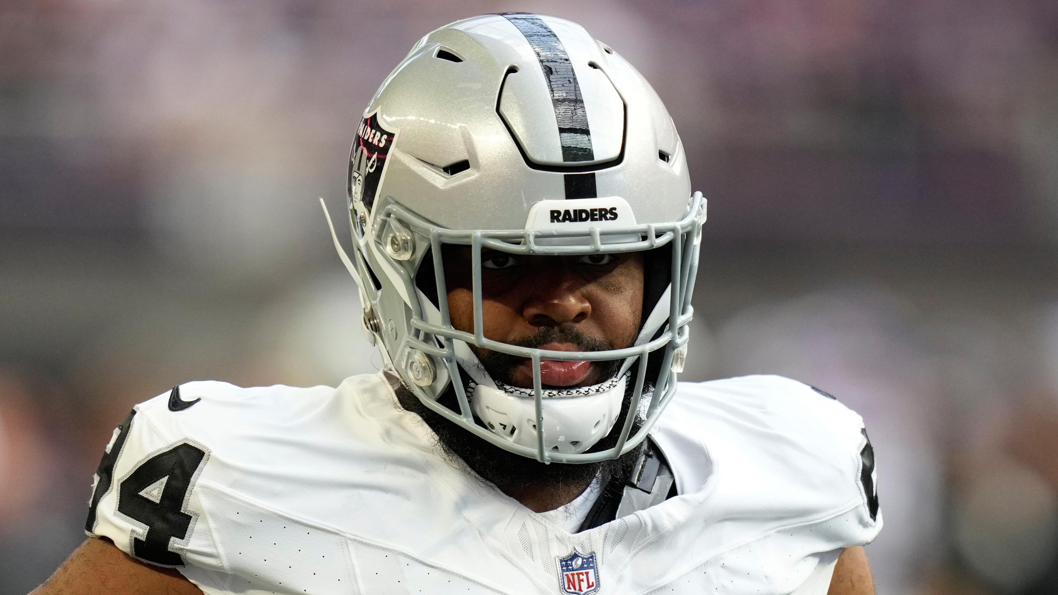 Schefter Reports Christian Wilkins 'Playfully Went to Kiss' Raiders Player's Head