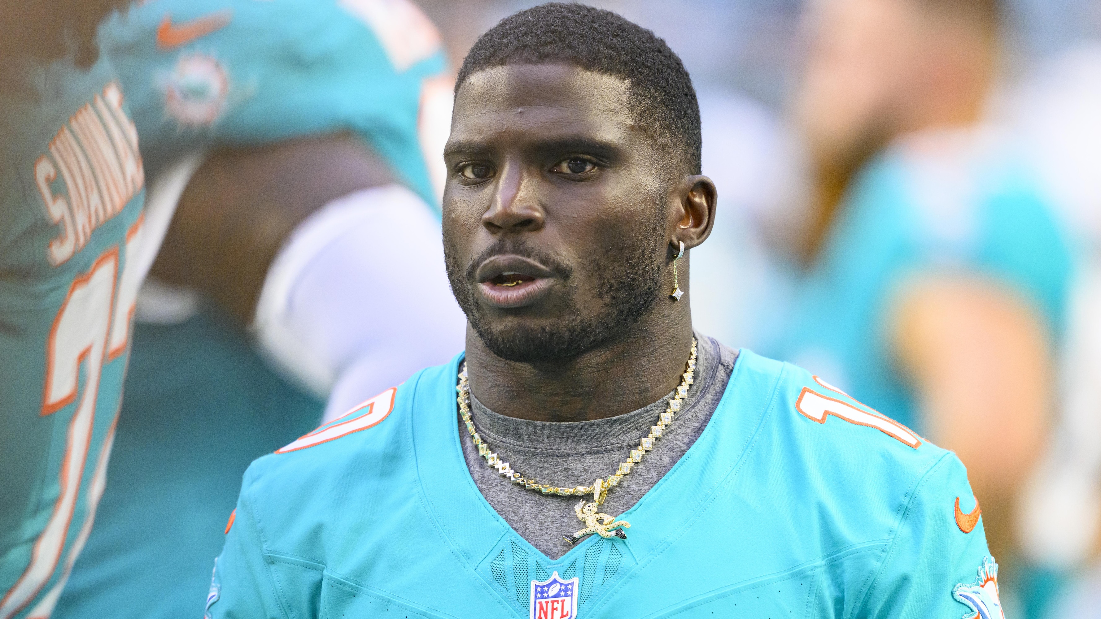 Dolphins' Tyreek Hill Hospitalized with Knee Injury After Being Carted Off vs. Jets