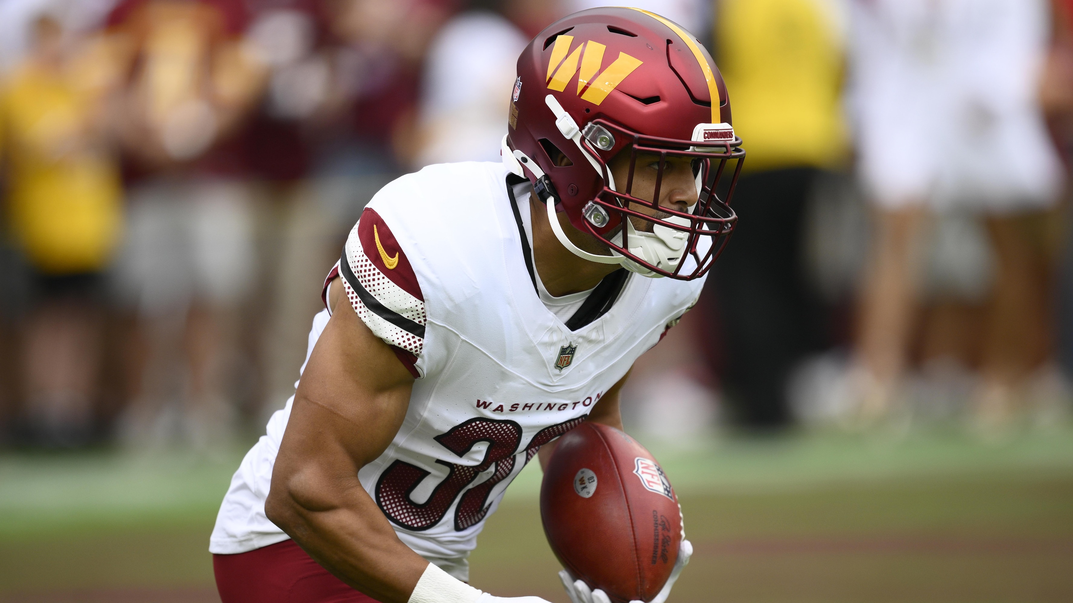 Commanders' Austin Ekeler Carted Off Field After Suffering Achilles Injury vs. Packers