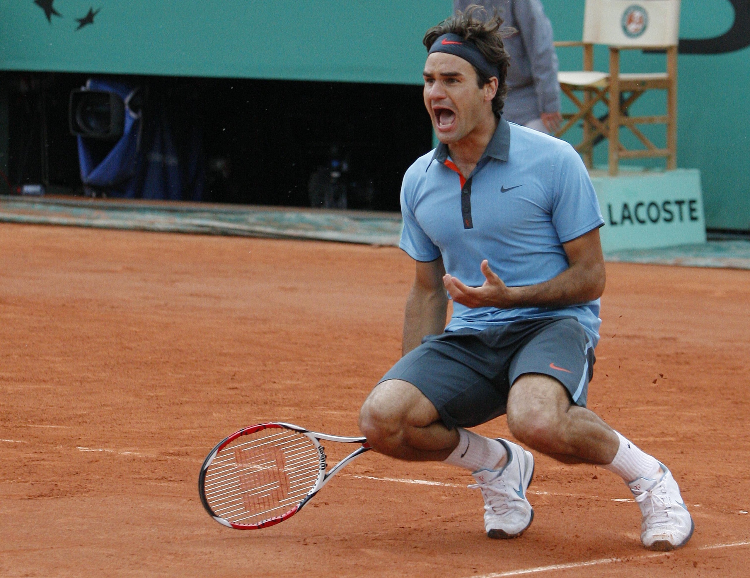 Swiss Roger Federer jubilates after winn