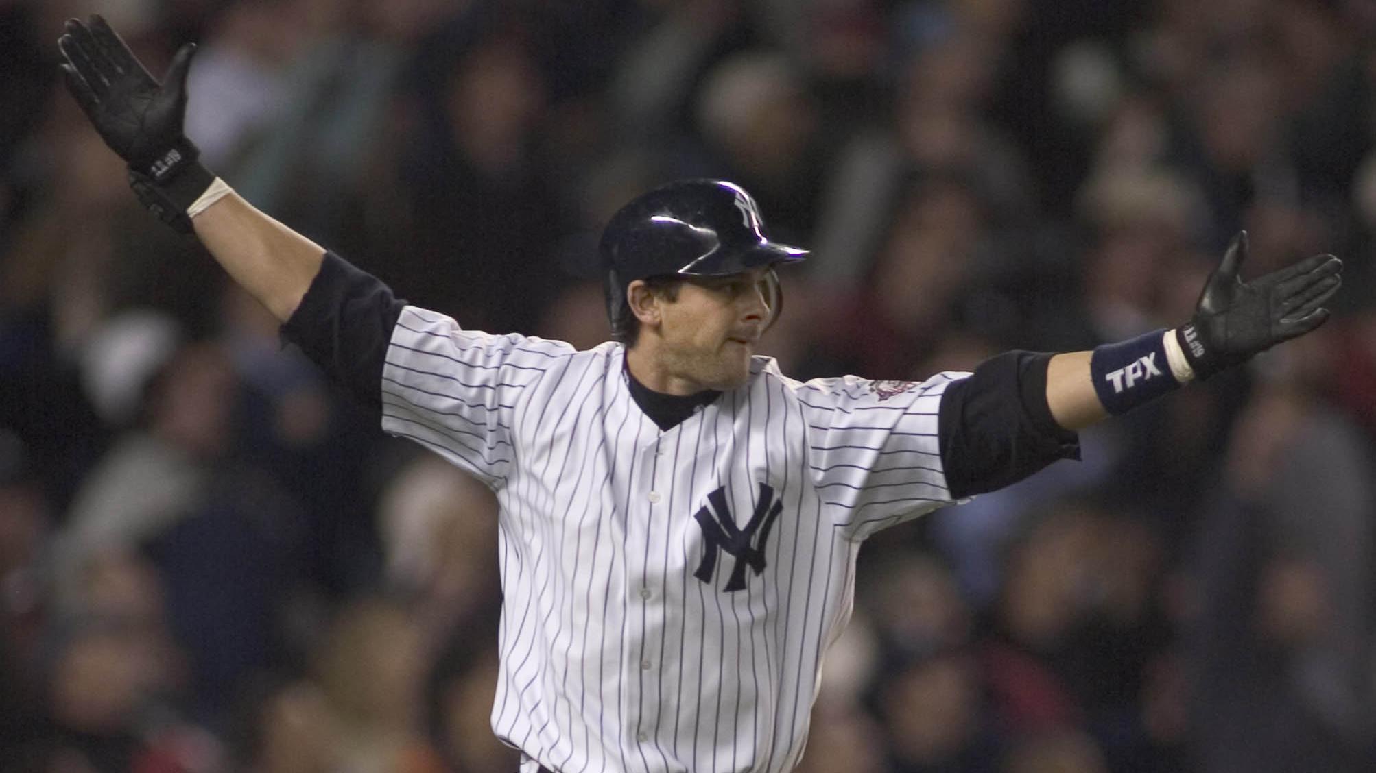 16 Oct 2003: Aaron Boone of the New York Yankees celebrates his game winning home run during the Yanks 6-5 victory over the Boston Red Sox in game 7 of the ALCS at Yankee Stadium in New York, NY.