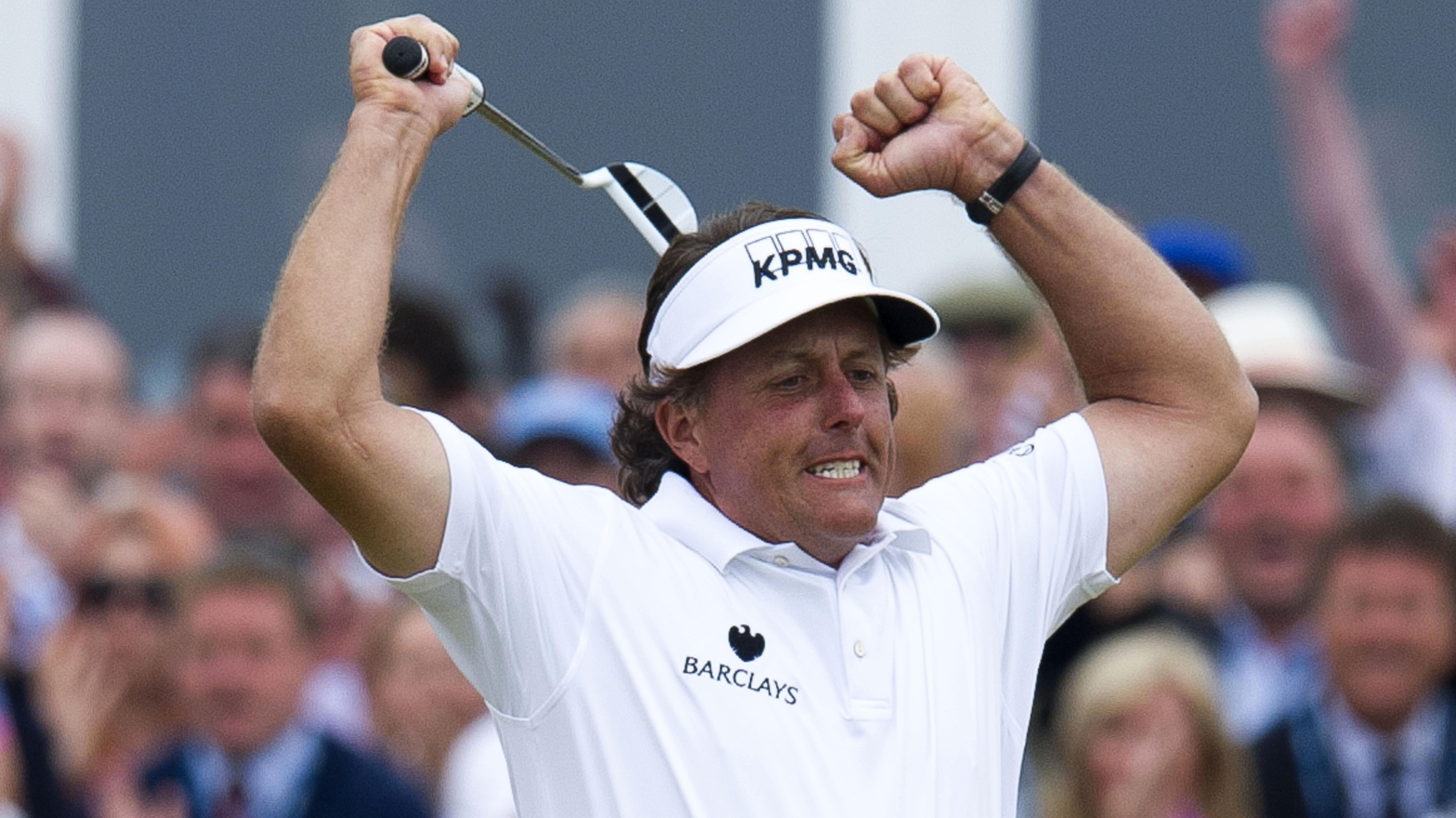 21/07/13 THE OPEN CHAMPIONSHIP.MUIRFIELD - EAST LOTHIAN.America's Phil Mickleson celebrates after sinking his birdie at the 18th to clinch the Open Championship