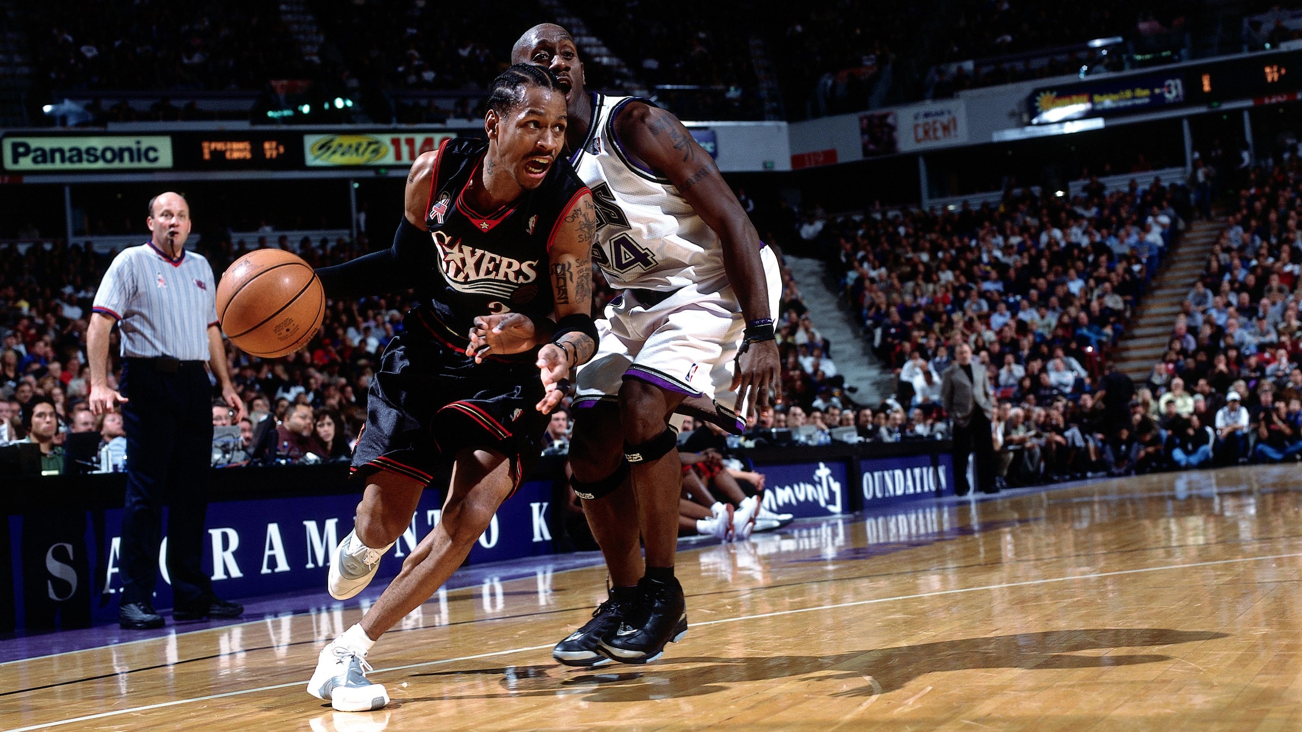 Iverson drives against the Kings