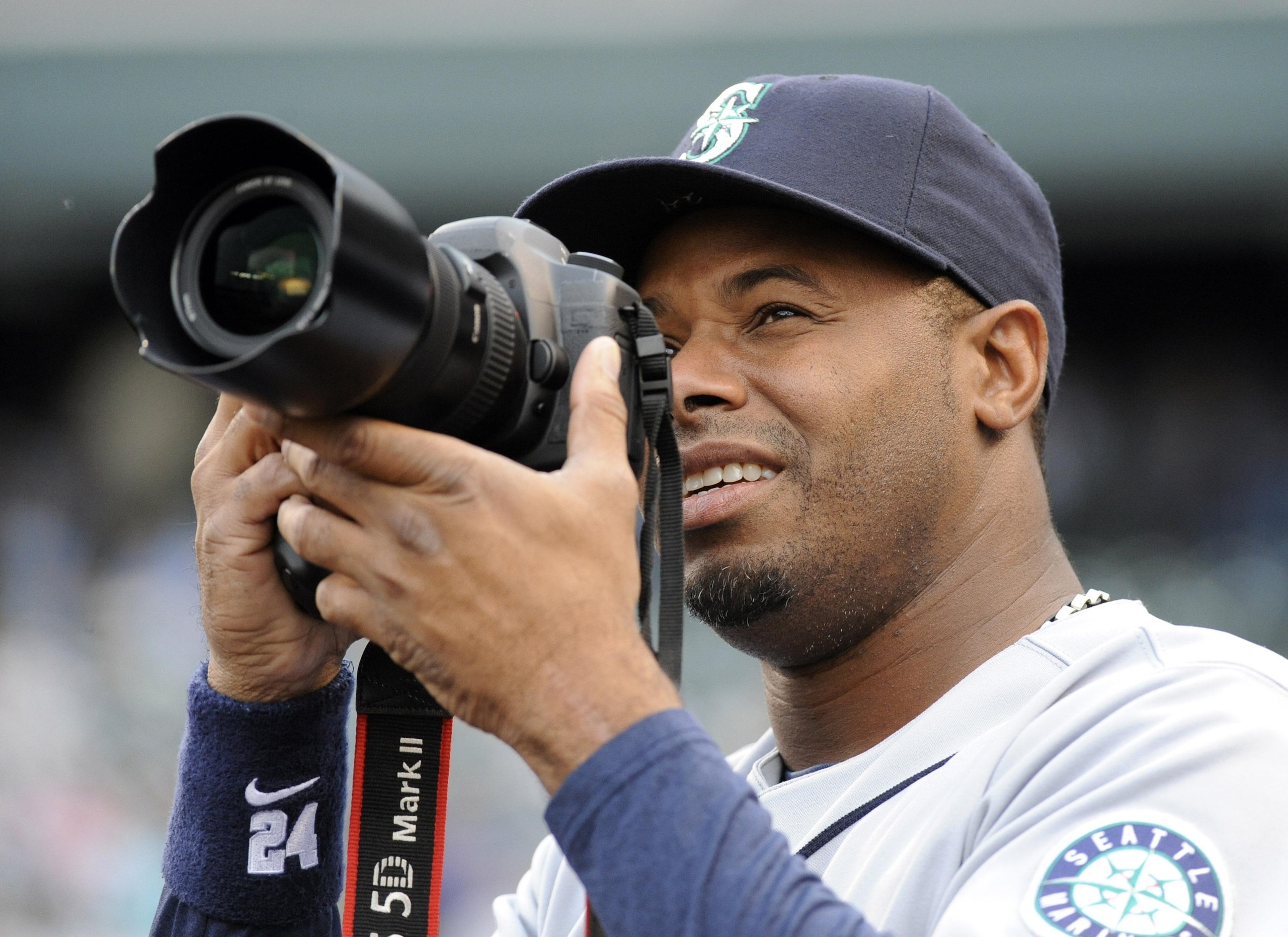 DENVER, CO--JUNE 12TH 2009--Seattle Mariner's superstar, Ken Griffey, borrowed a photographer's camera and took a few pictures from the dugout just before they played the Colorado Rockies at Coors Field Friday evening. THE DENVER POST/ANDY CROSS