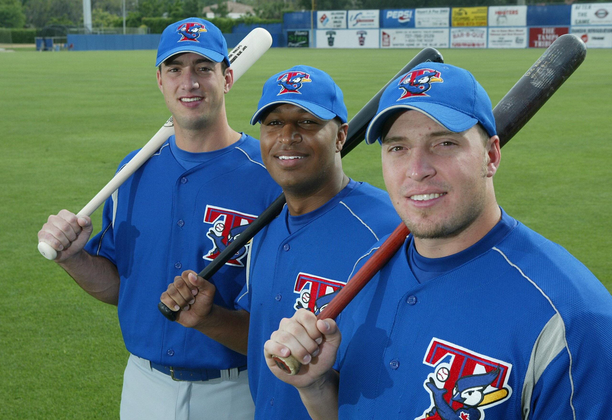 The second year sluggers for the Blue Jays L-R Josh Phelps, Vernon Wells and Eric Hinske on the fiel