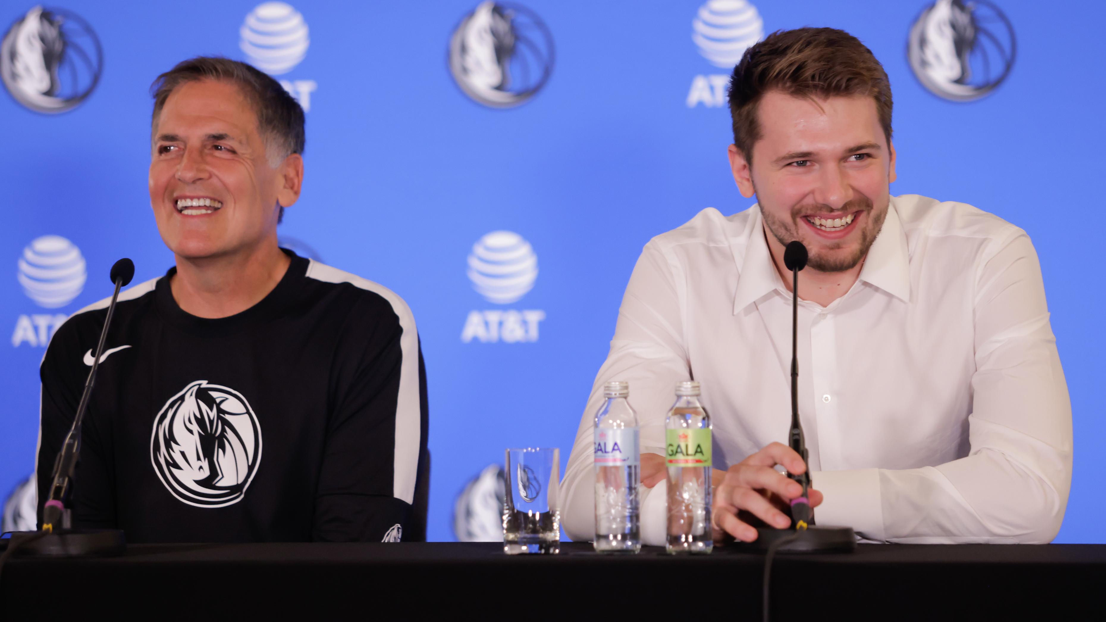 Dallas Mavericks owner Mark Cuban and Luka Doncic speak at a