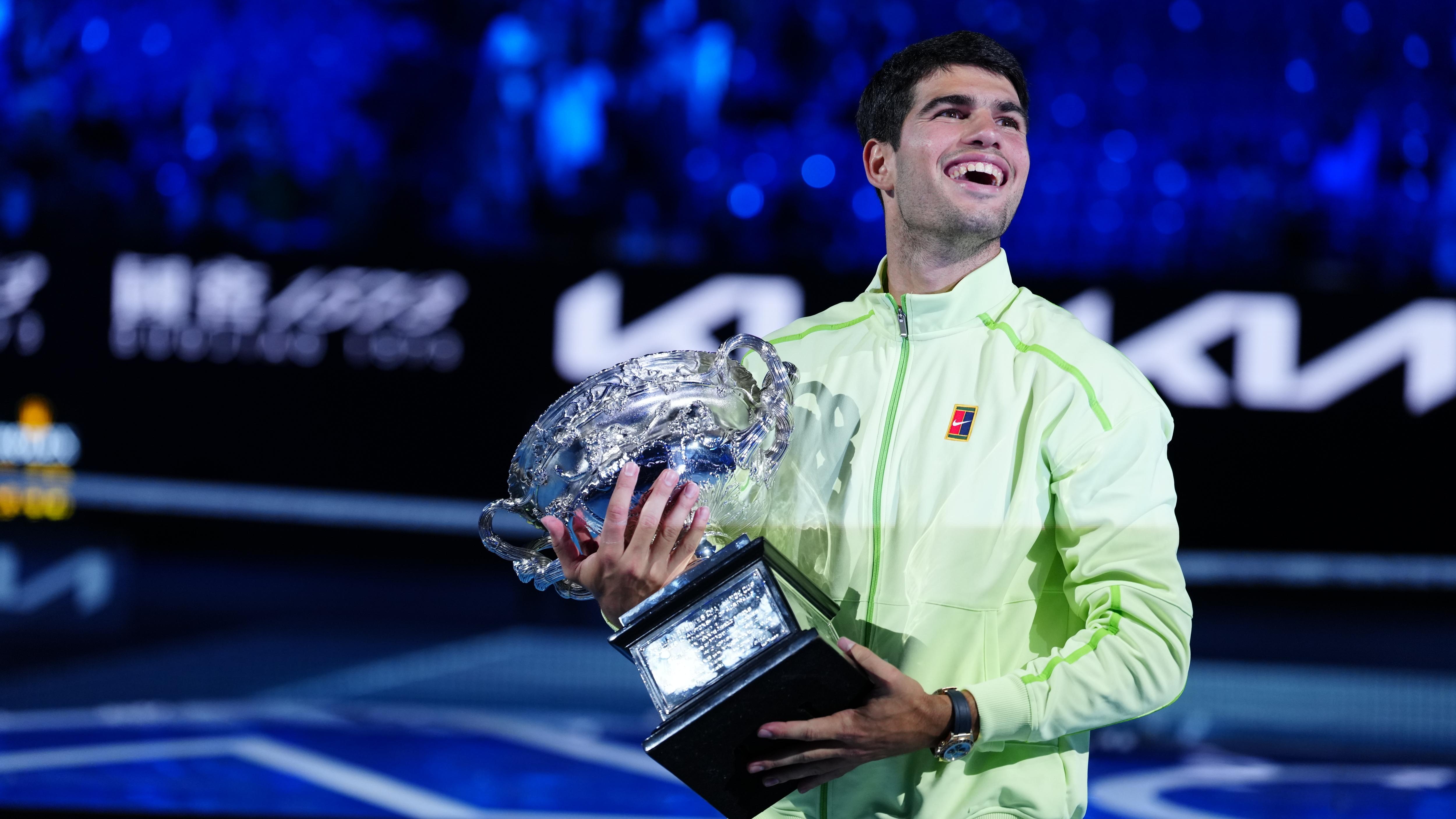 Carlos Alcaraz of Spain seen holding the Norman Brookes
