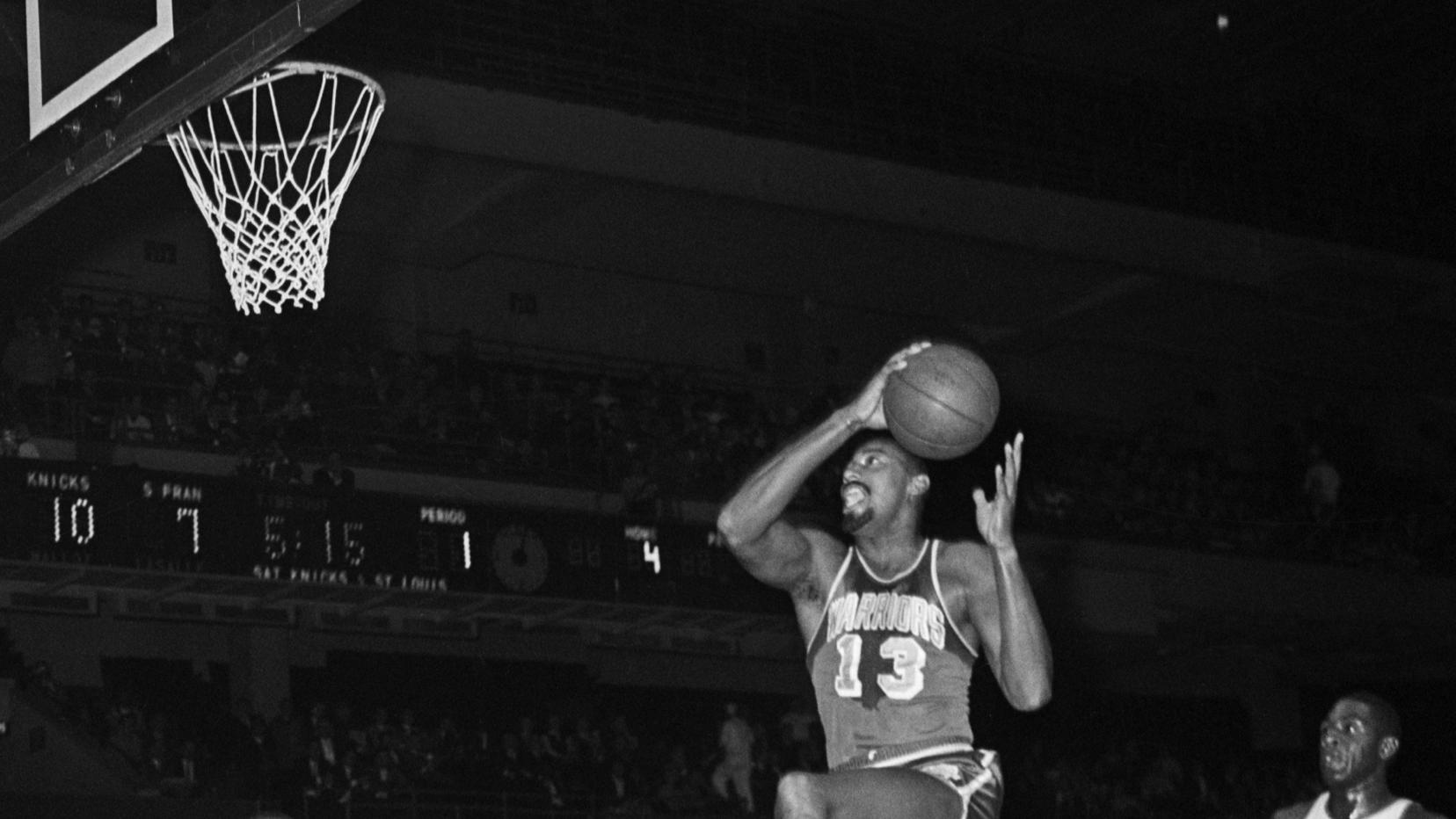 Wilt Chamberlain Jumping Towards Basket