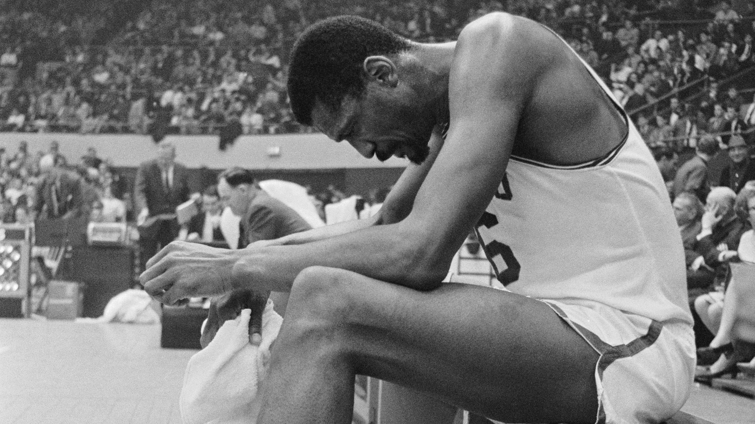Bill Russell Resting on a Bench