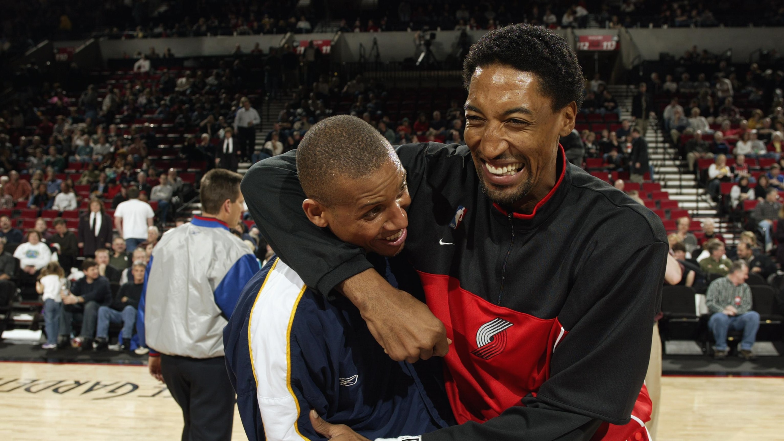 Reggie Miller shares a moment with Scottie Pippen 