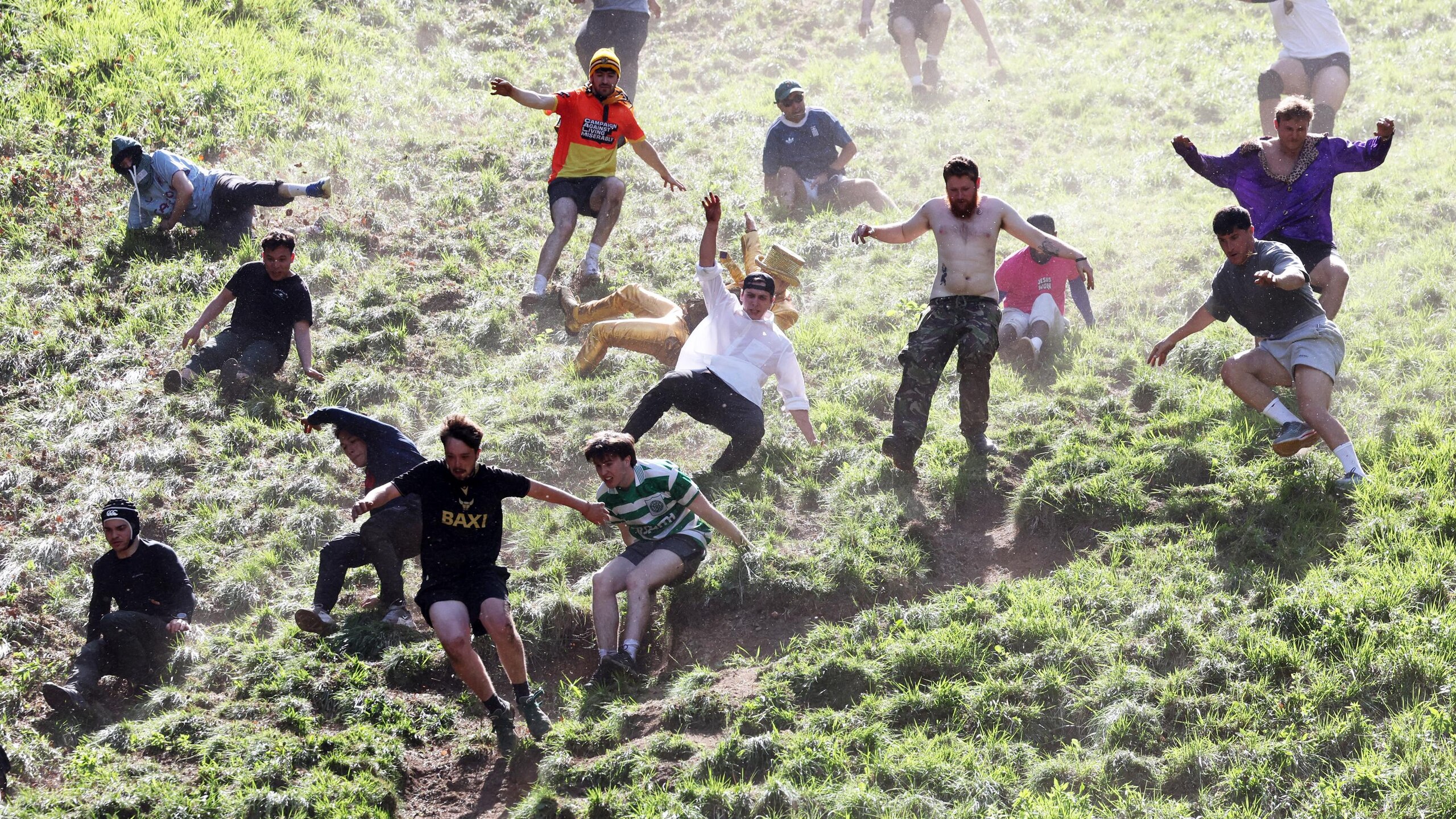 Annual Cooper's Hill Cheese-Rolling Event Takes Place In Gloucester