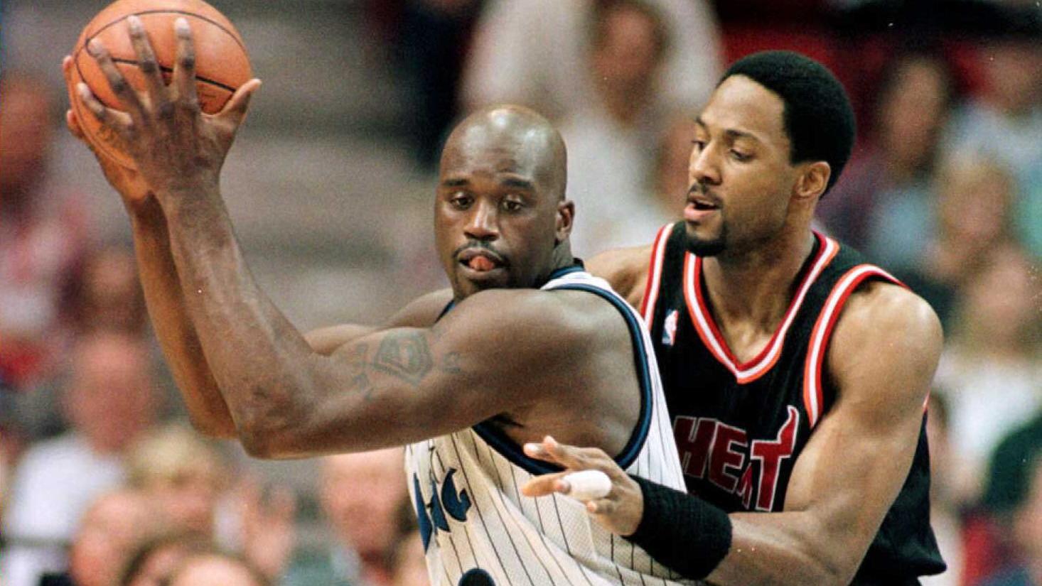 Orlando Magic center Shaquille O'Neal (L) takes co