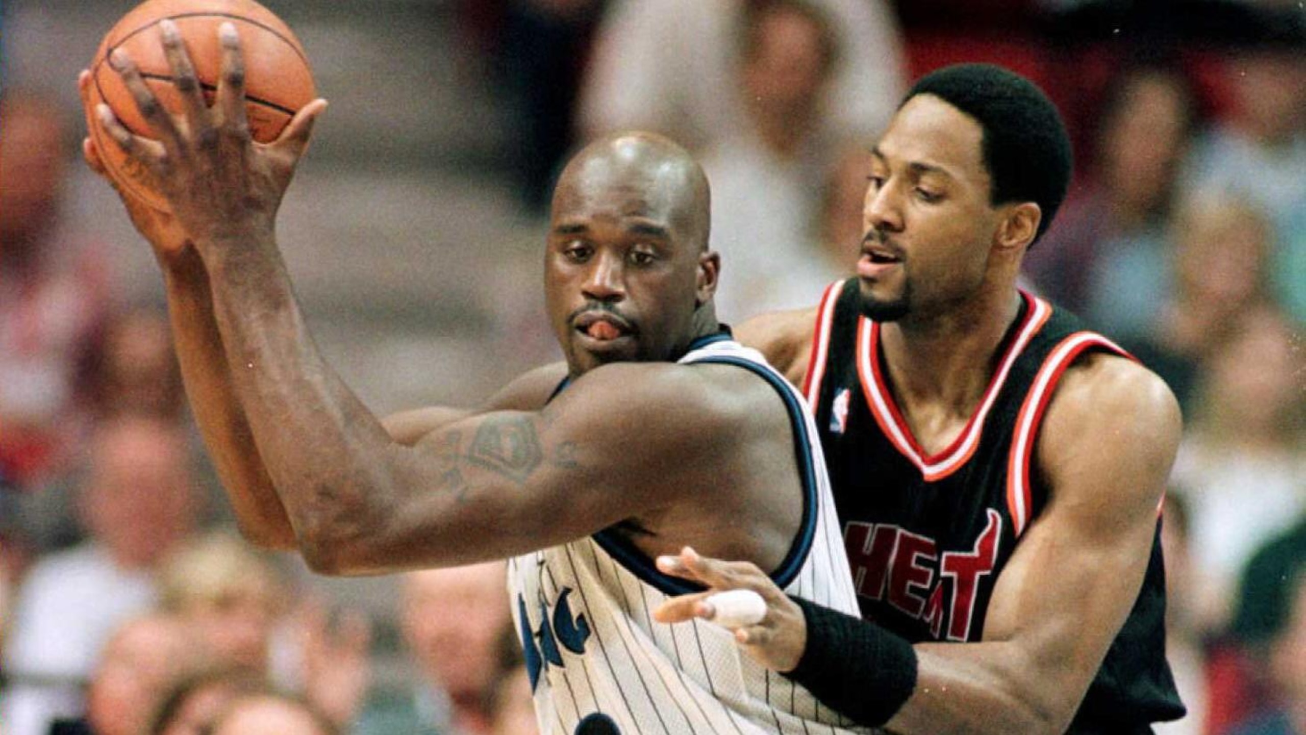 Orlando Magic center Shaquille O'Neal (L) takes co