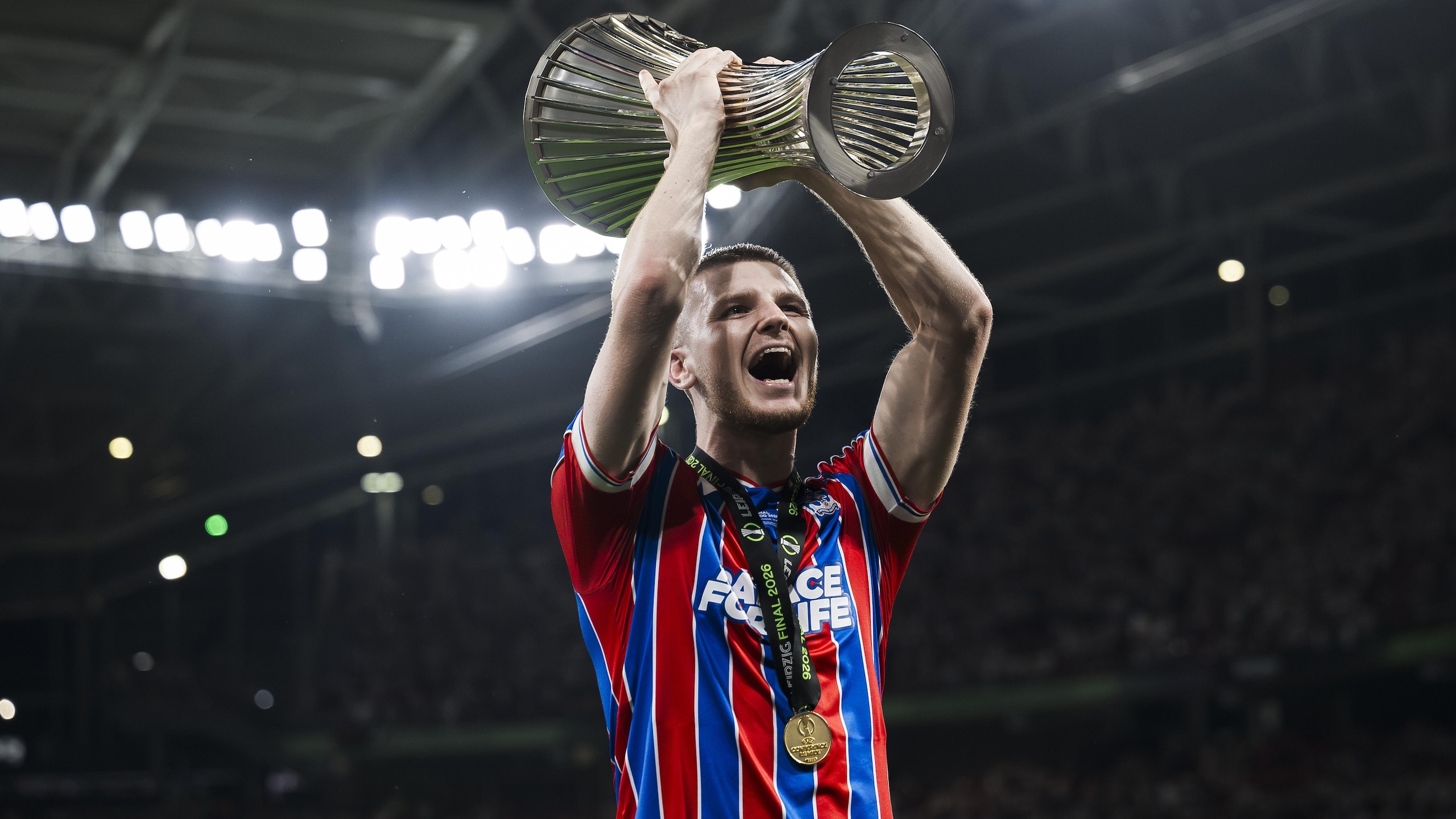 Adam Wharton of Crystal Palace FC lifts the trophy during