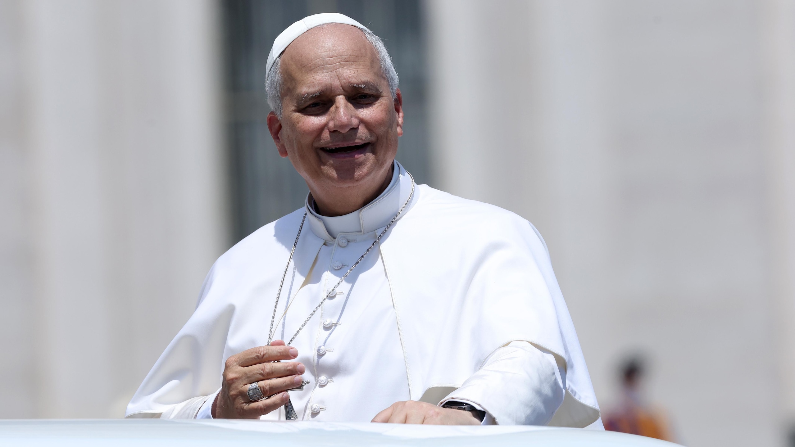 The pontiff seen waving to the faithful as he leaves the