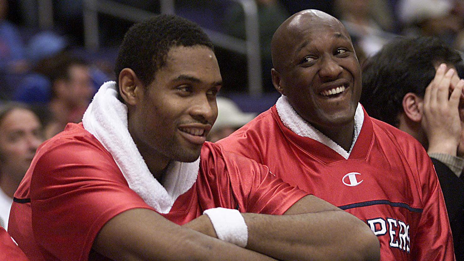 Clippers Michael Olowokandi and Lamar Odom happy over a winnof the Indian Pacers at Staple Center su