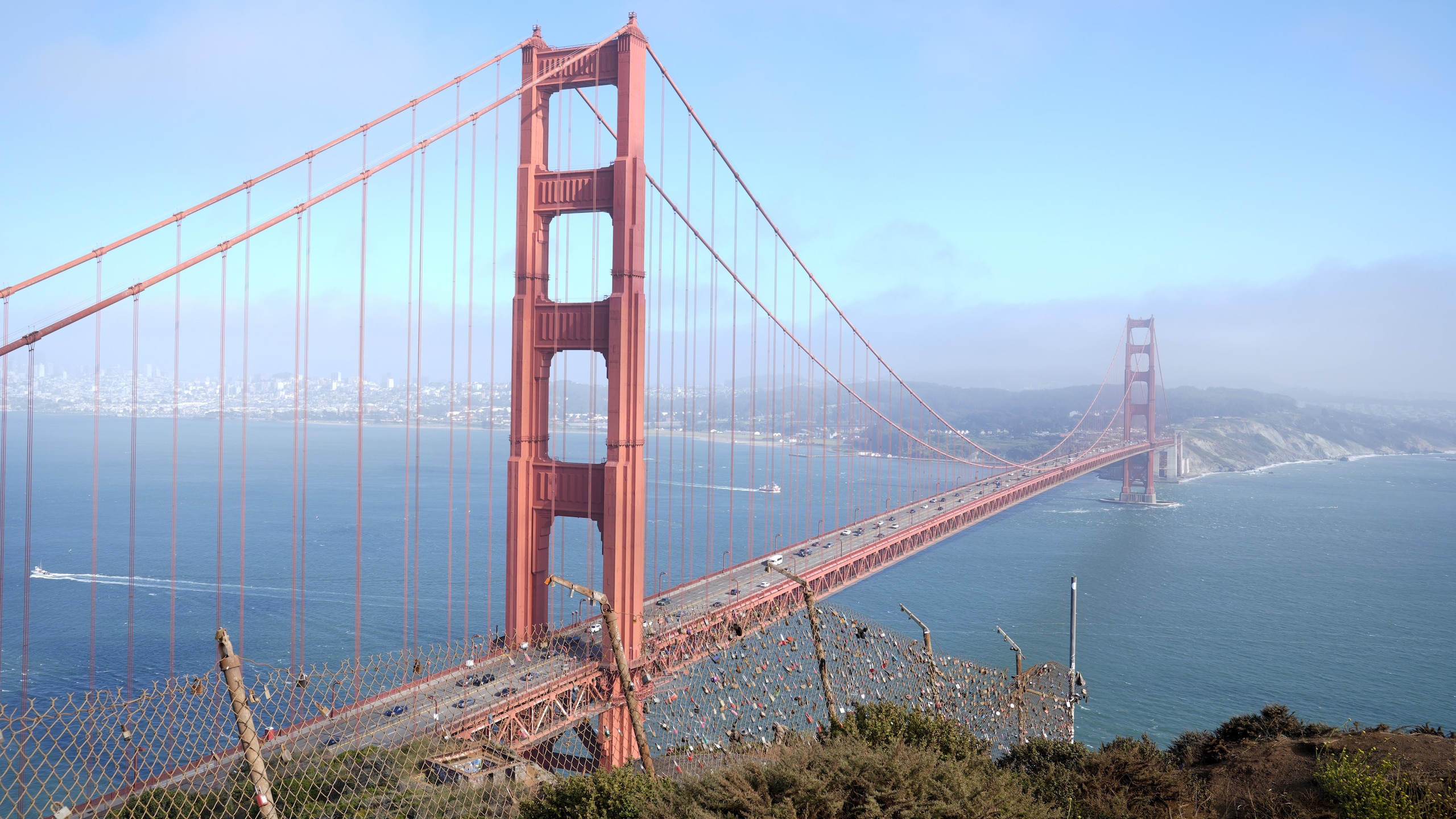 Tourists visit San Francisco's Golden Gate Bridge