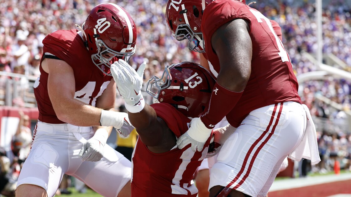 Watch Alabama Staffer Take Huge Hits from Players During Pre-Game Warmups in Trending Video