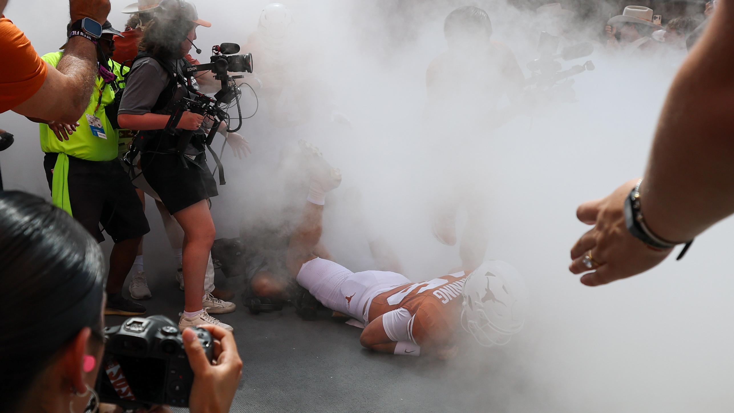 Arch Manning Jokes About Viral Video of Texas QB Falling During Pregame Smoke Entrance