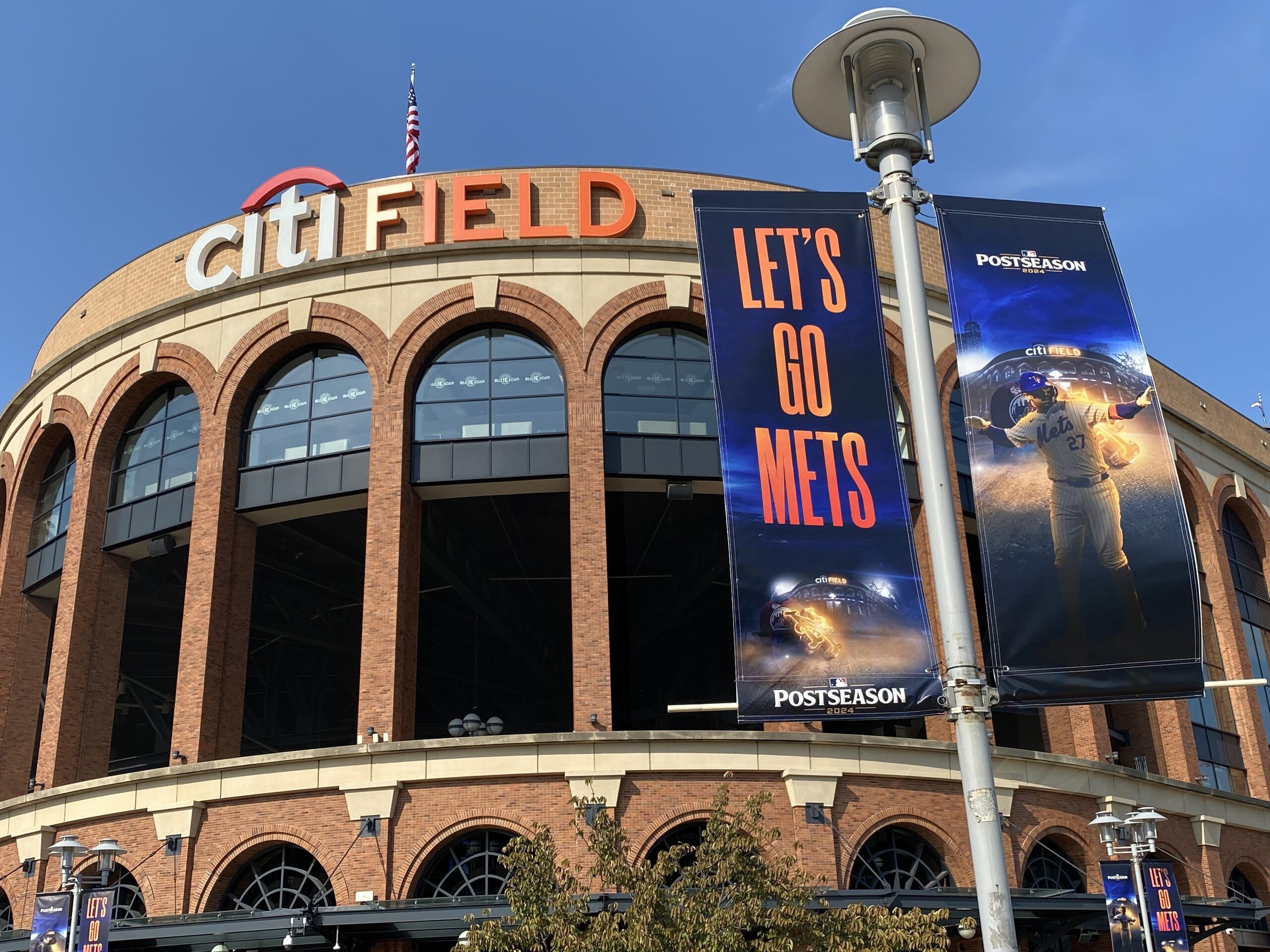 View of CitifField with Lets go Mets banner, Queens, New York View of CitifField with Lets go Mets banner, Queens, New York