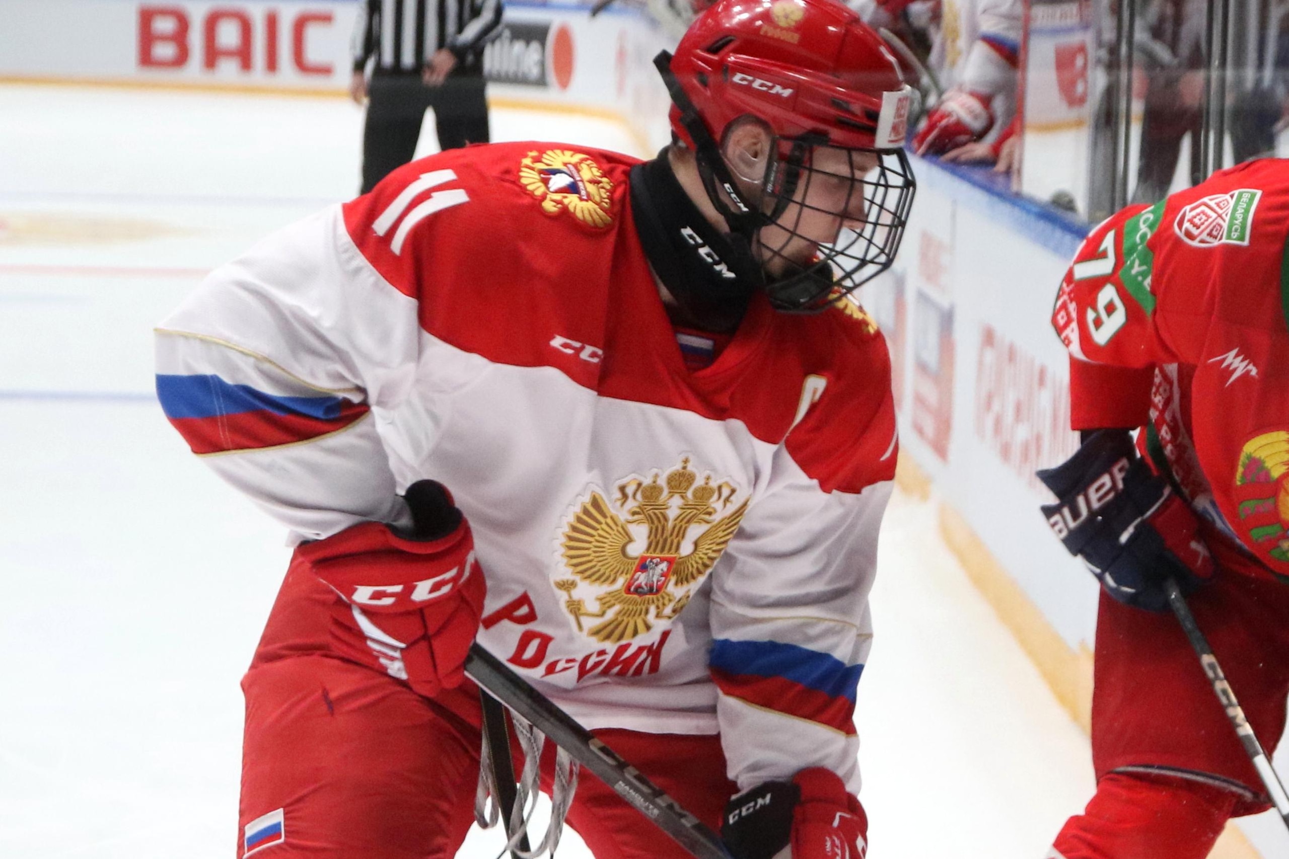 Ivan Ryabkin (11) Russia U18 and Timofey Mamanovich (79) of... Ivan Ryabkin (11) Russia U18 and Timofey Mamanovich (79) of...