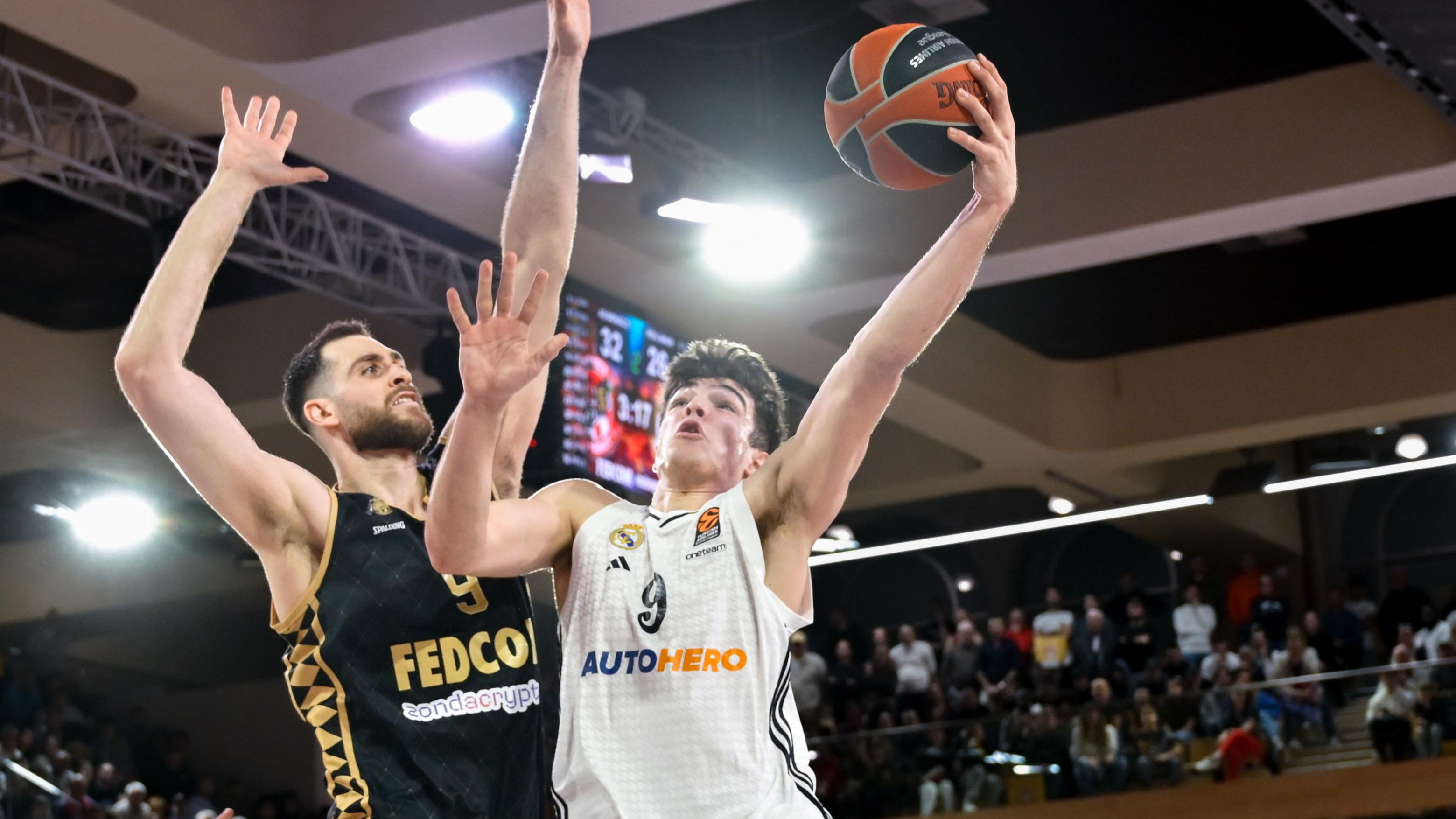 9 Georgios Papagiannis of Monaco seen in action with Madrid...