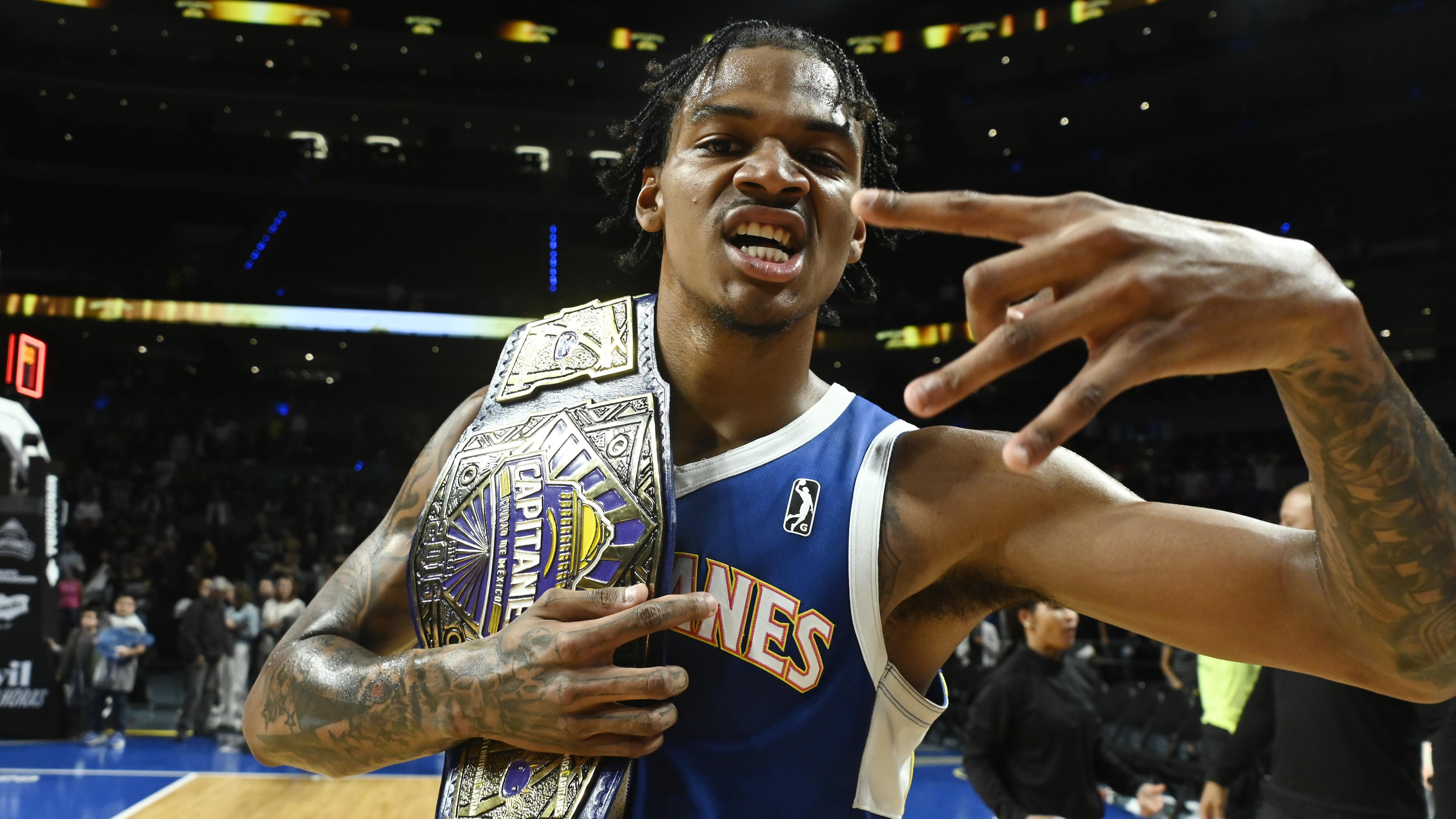 Capitanes Guard Dink Pate #1 celebrating after the NBA G...