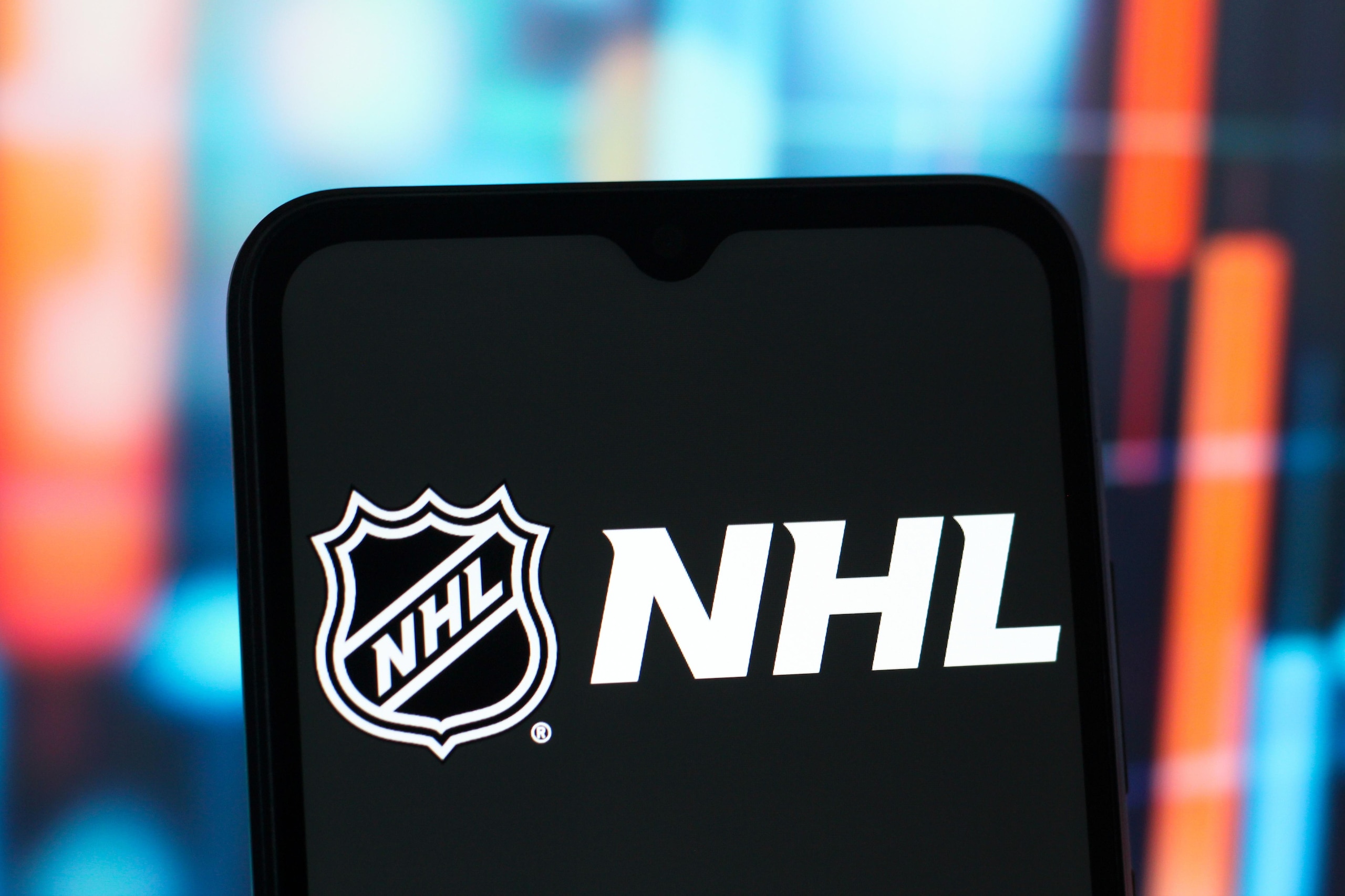 In this photo illustration, the NHL (National Hockey League...