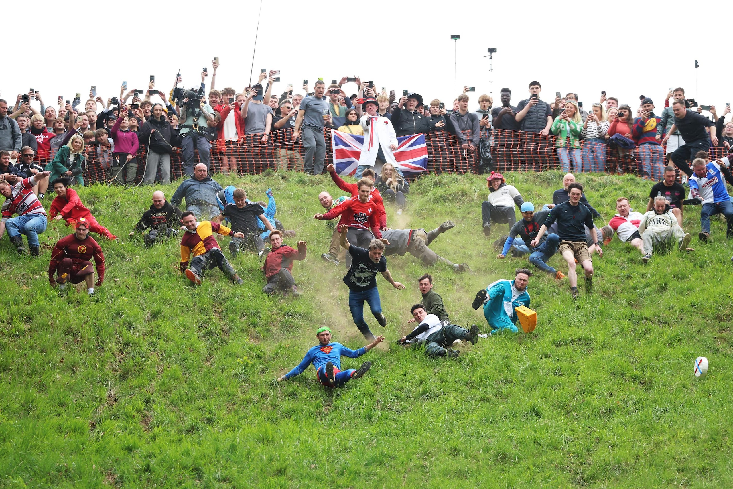 Annual Cooper's Hill Cheese-Rolling Event Takes Place In Gloucester