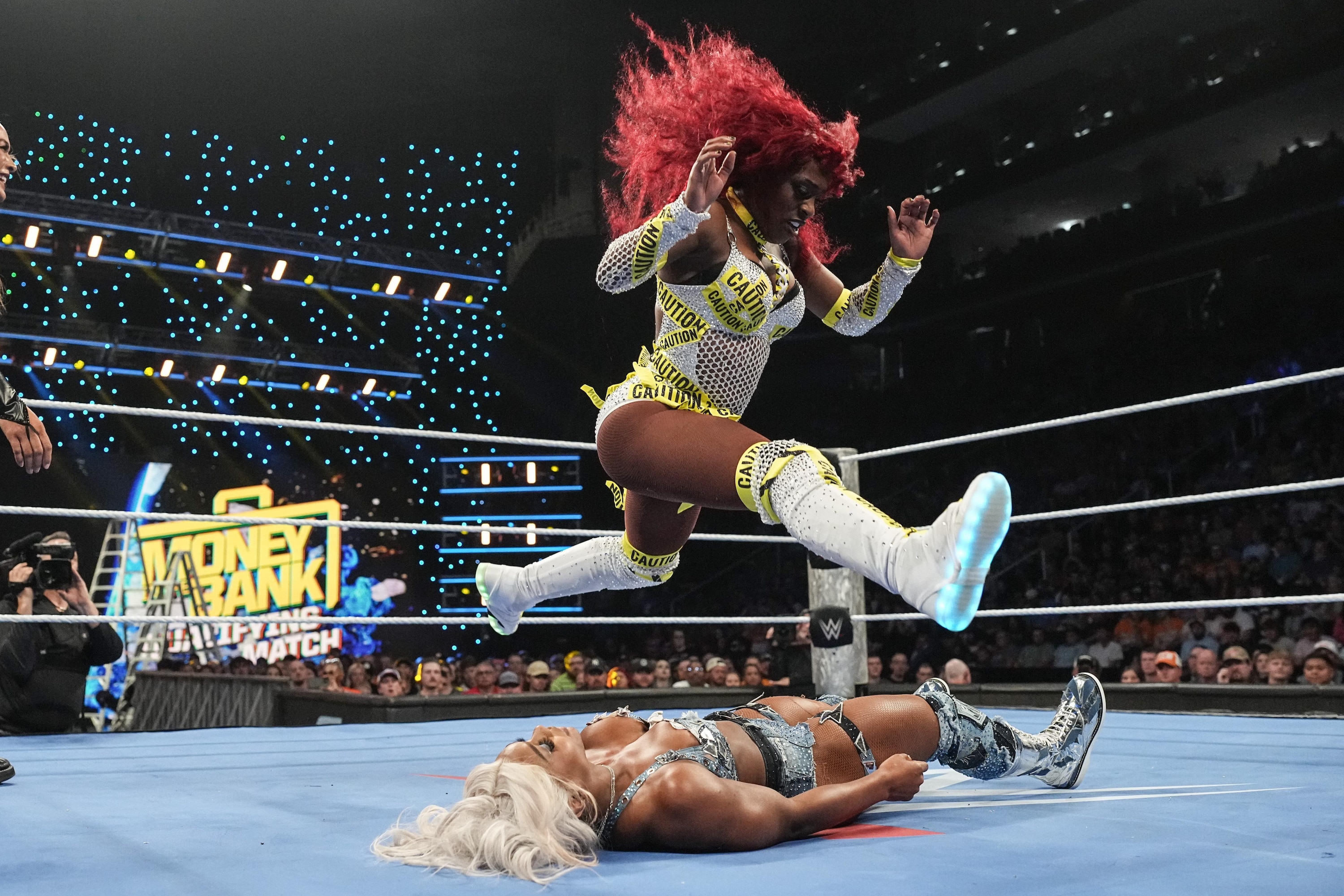 Naomi Wins Women's WWE Money in the Bank Ladder Match