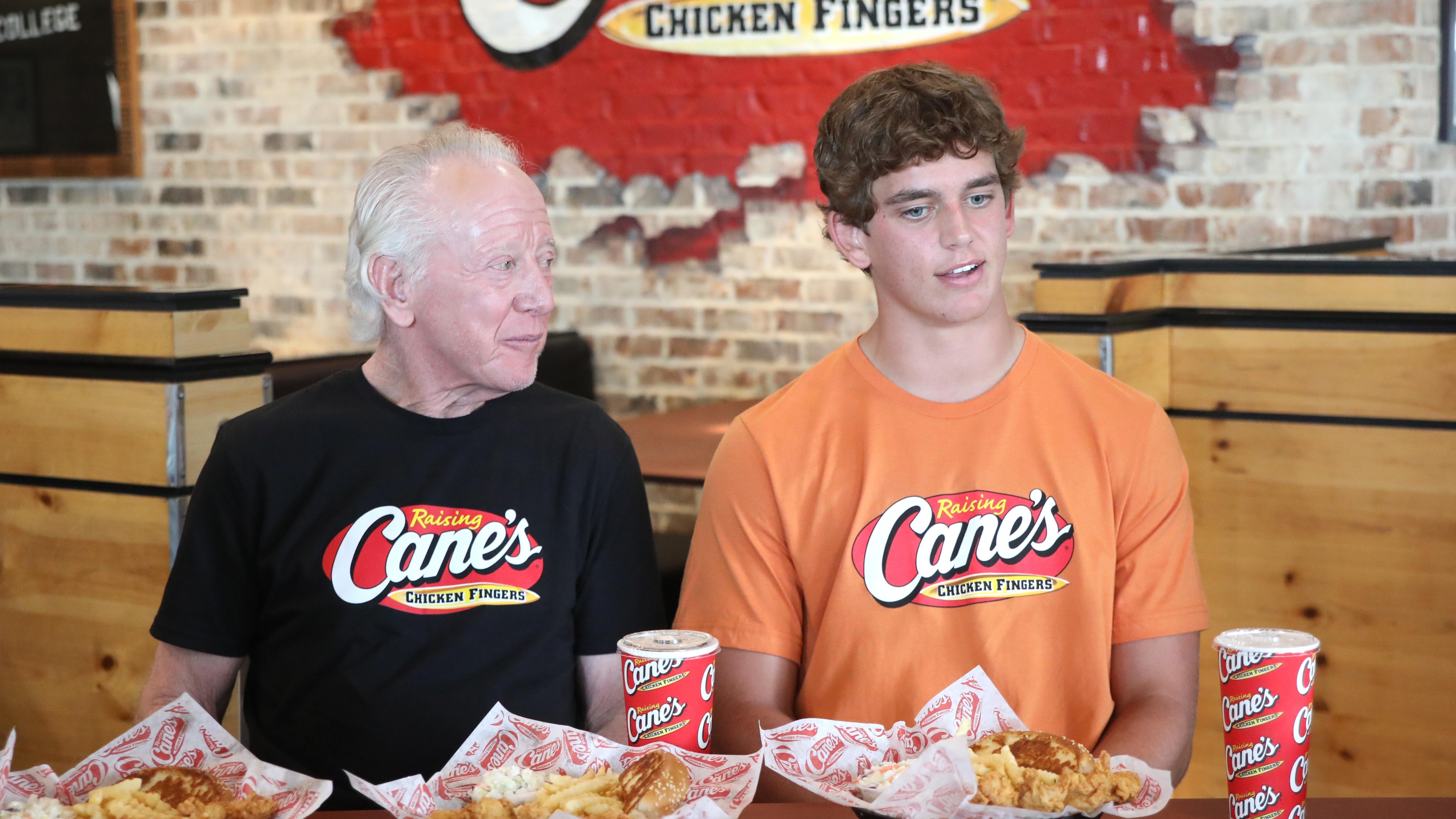 Arch, Cooper And Archie Manning Work A Pre-Manning Passing Academy "Shift" With LSU Quarterback Garrett Nussmeier At Raising Cane's Thibodeaux, Louisiana
