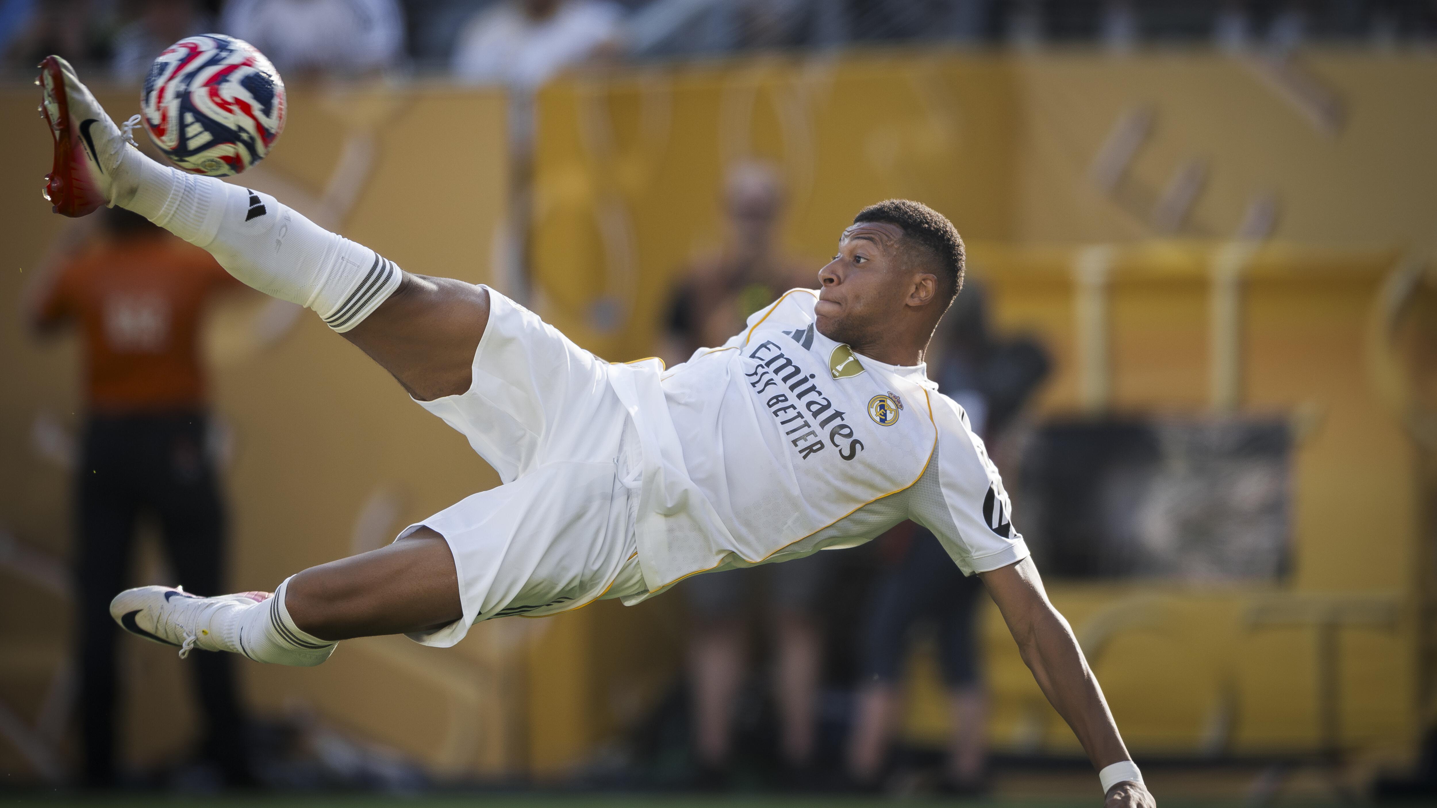 Kylian Mbappe of Real Madrid CF scores a goal from a bicycle...