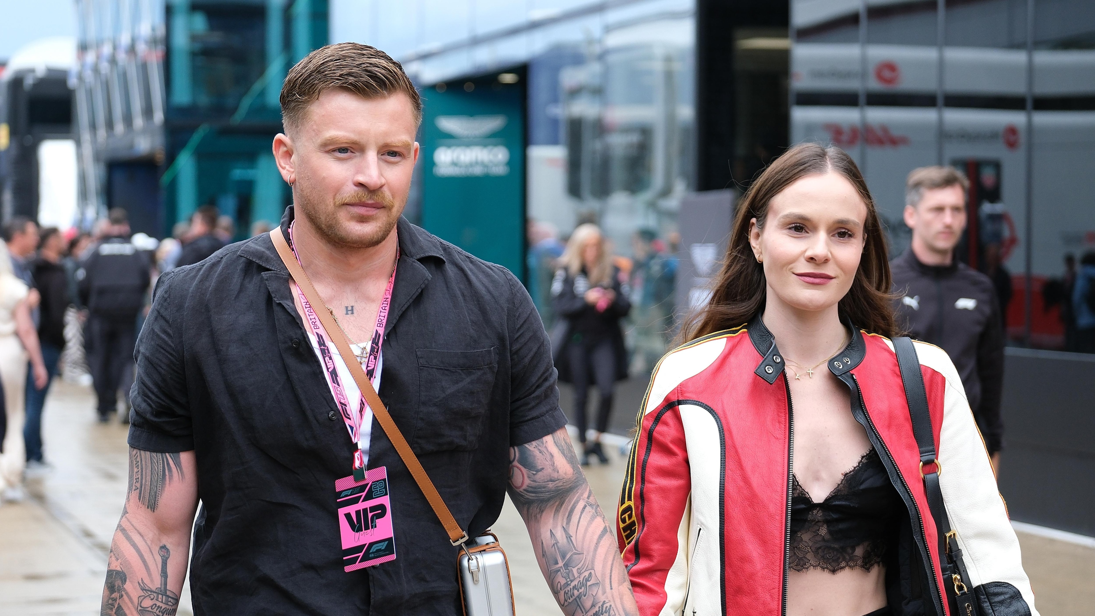 Olympic swimmer Adam Peaty and partner Holly Ramsay are seen...