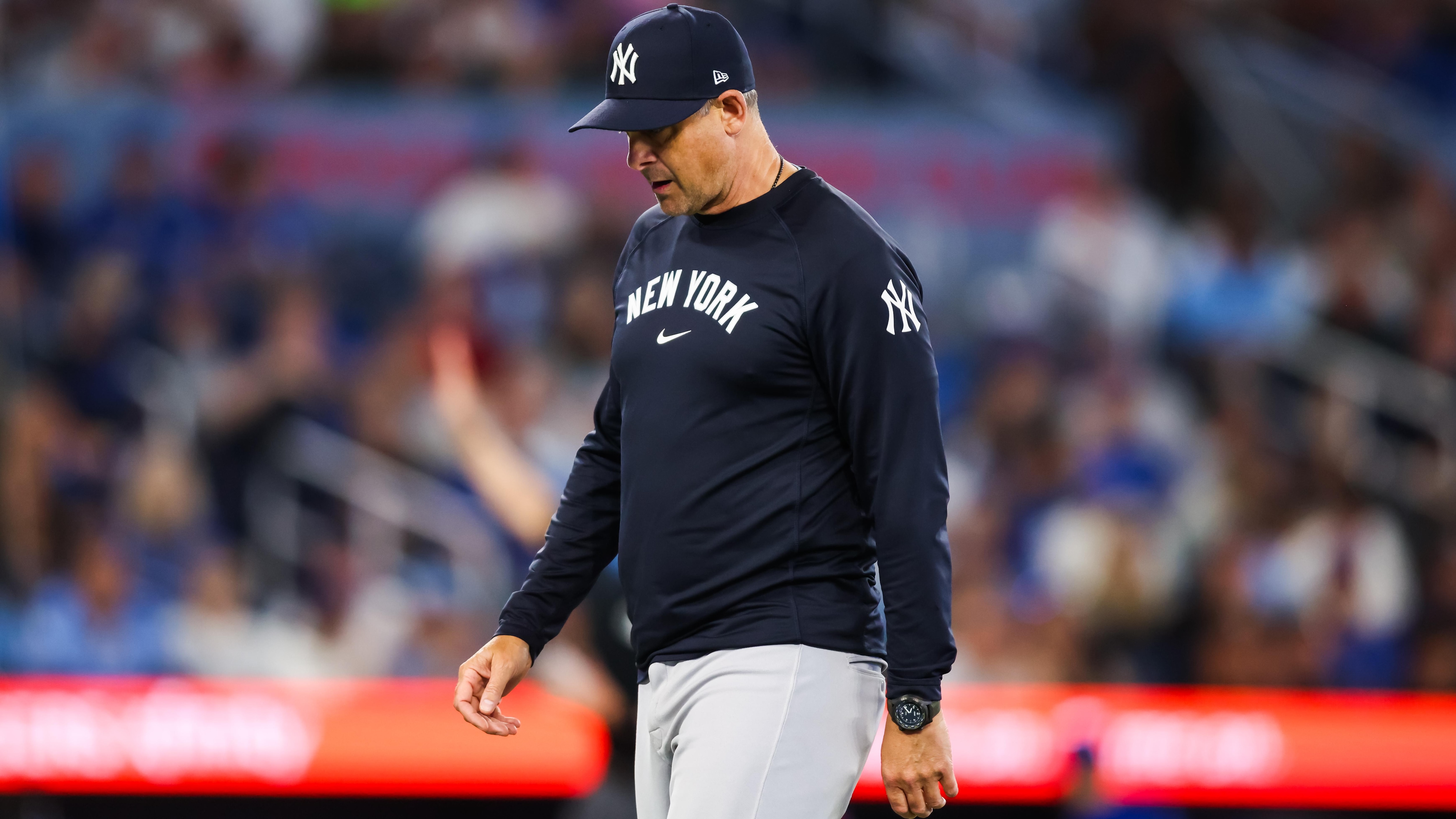Yankees Fans Wear Paper Bags, Rip Aaron Boone in Viral Photos During Loss to Astros