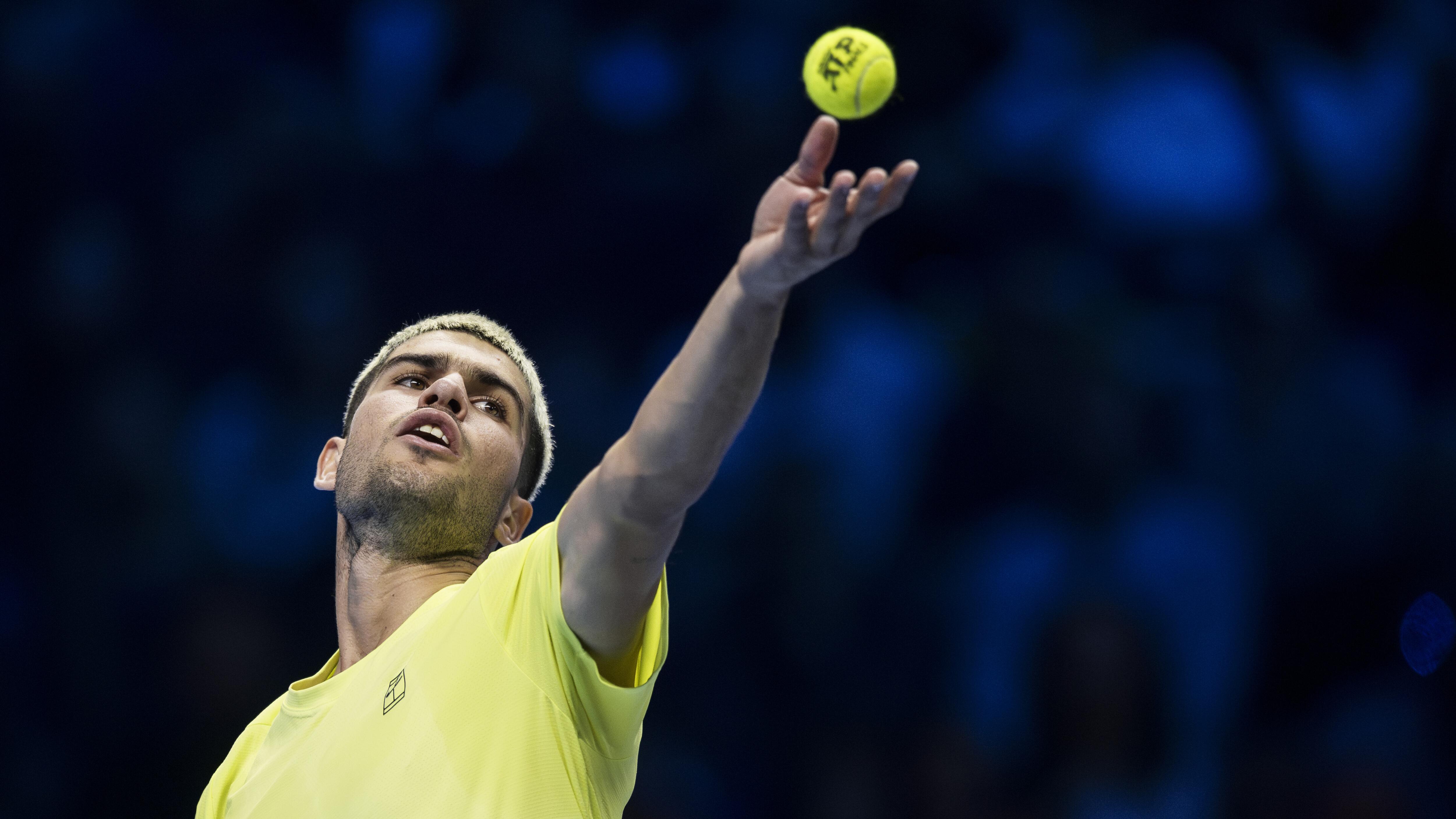 Carlos Alcaraz of Spain serves during his round robin...