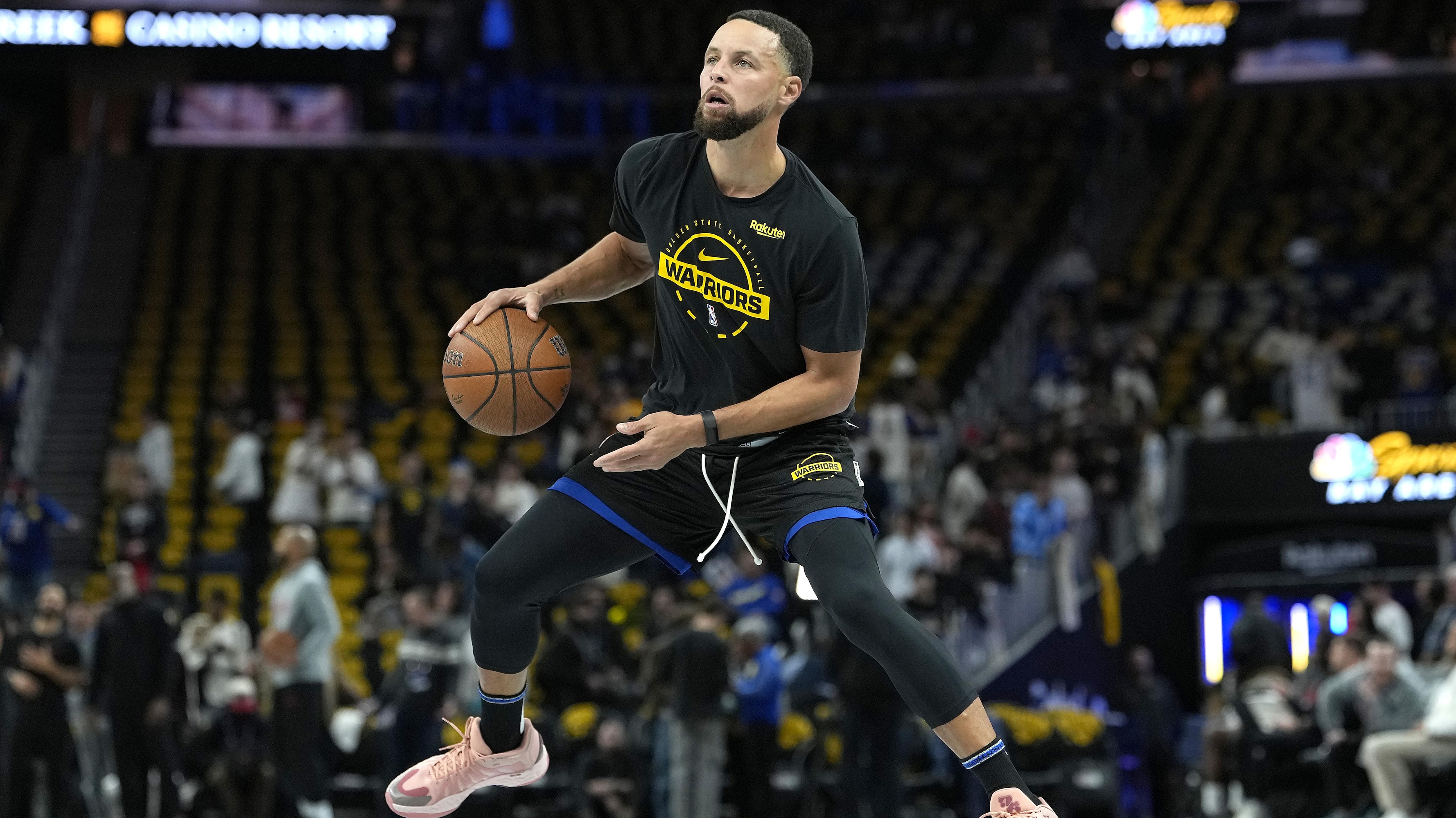 Caitlin Clark Jokes Video of Stephen Curry's Pregame Full-Court Shot 'Has to Be AI'