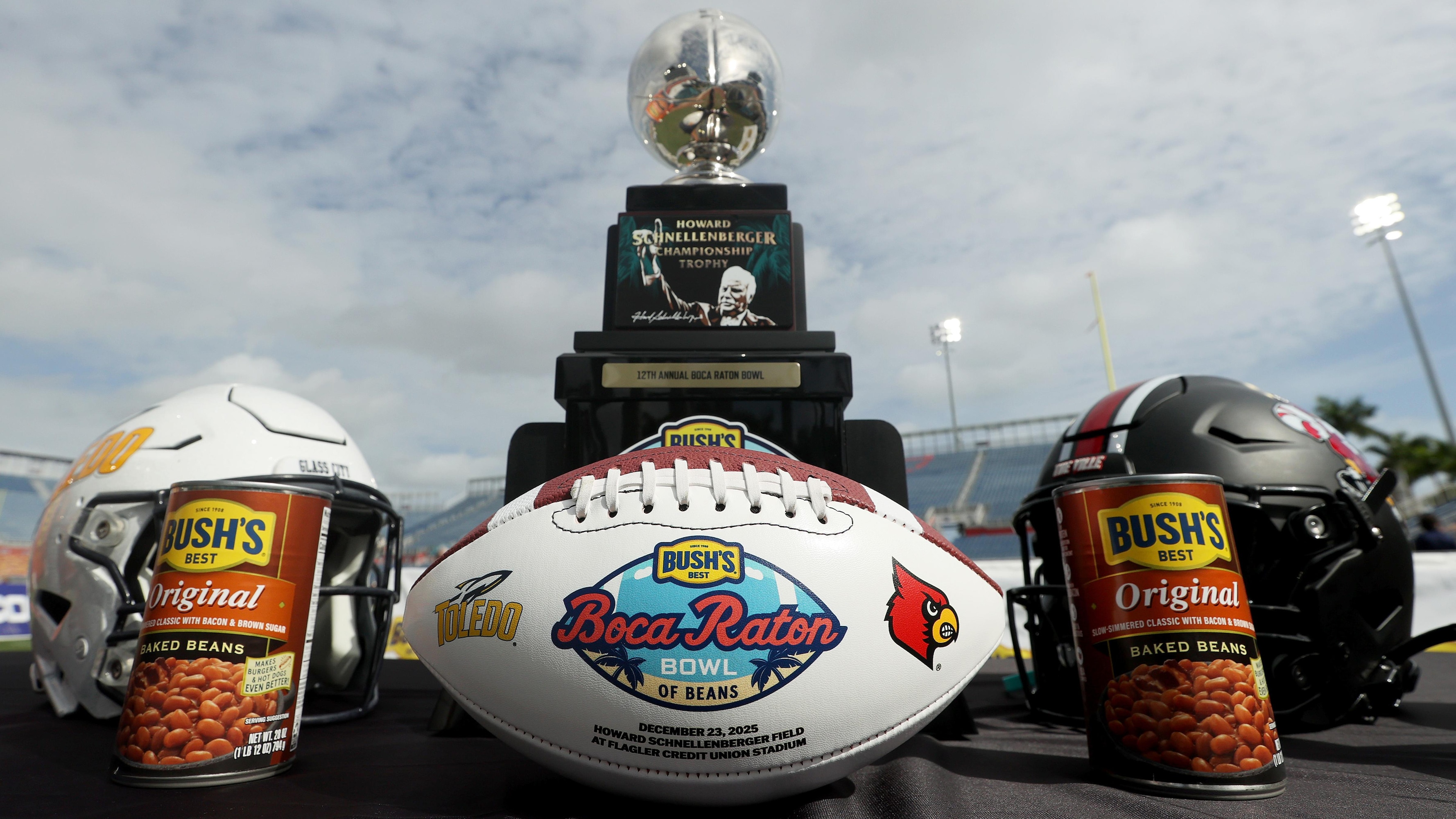 Louisville CFB Players Eat Beans Out of Boca Raton Bowl Trophy After Win in Photos