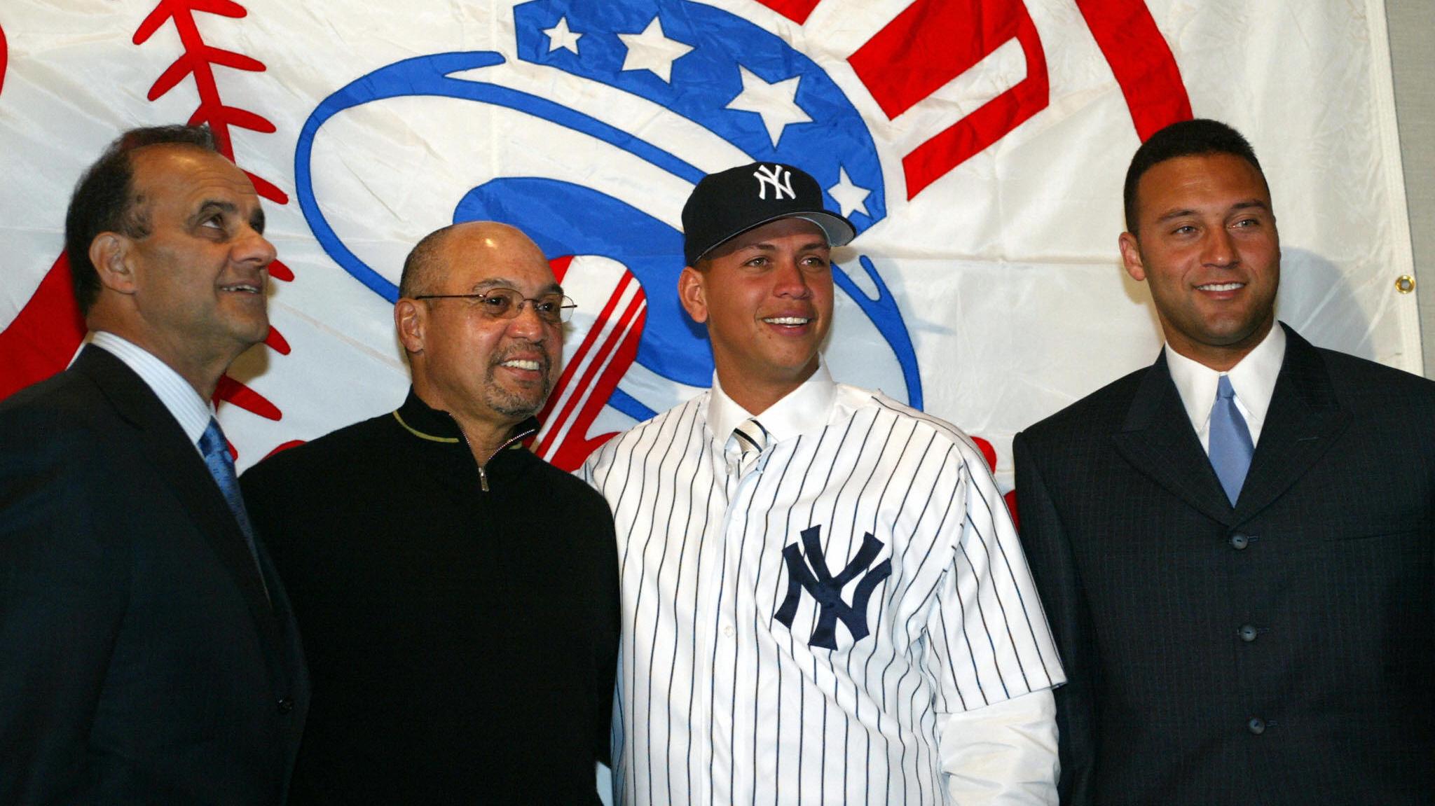 Alex Rodriguez (2nd-R) is joined 17 Febr