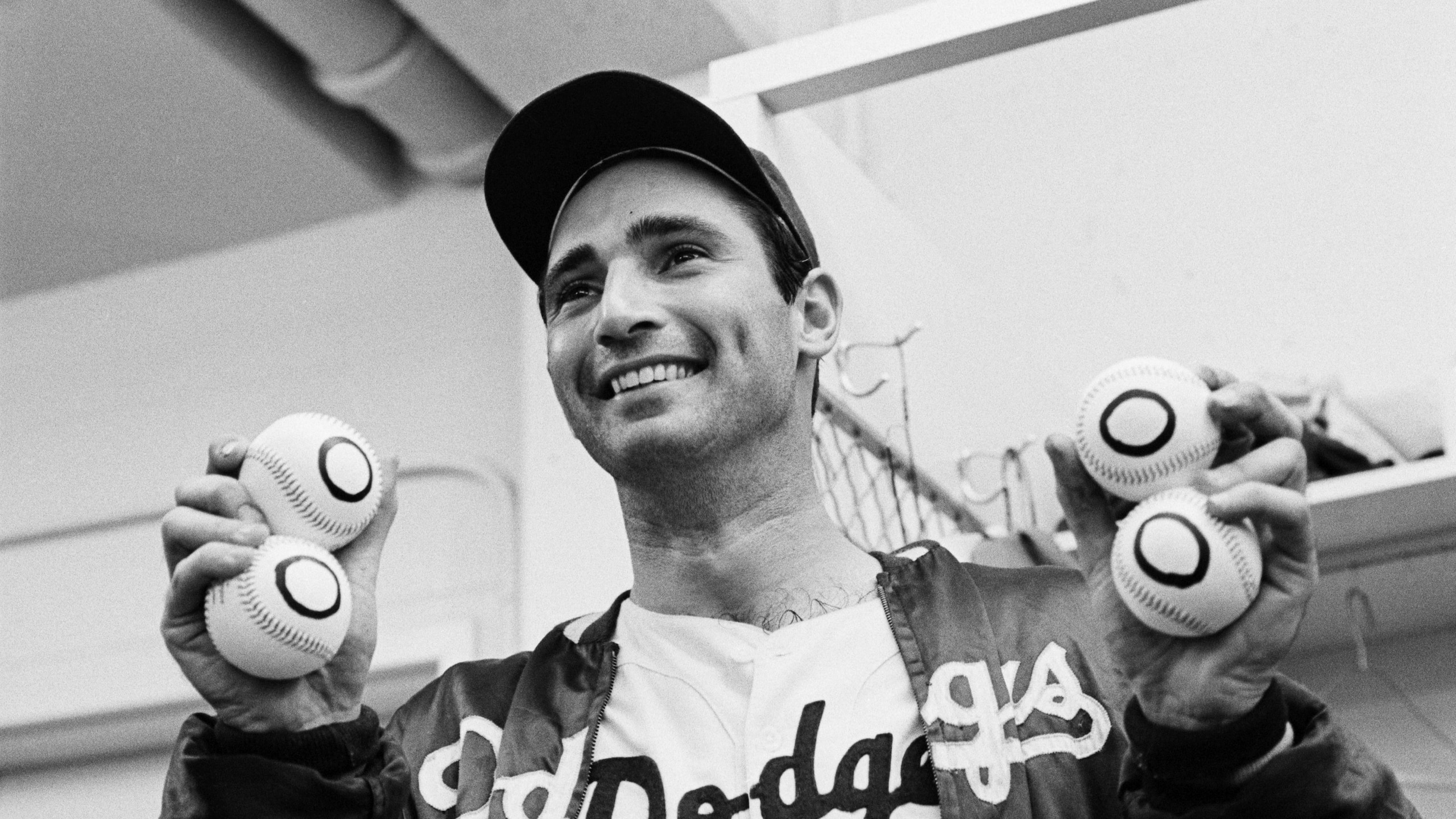 Sandy Koufax Holding 4 "Zero" Baseballs