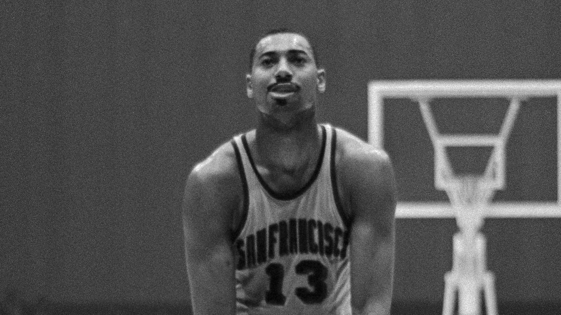 Wilt Chamberlain with Basketball Between Knees
