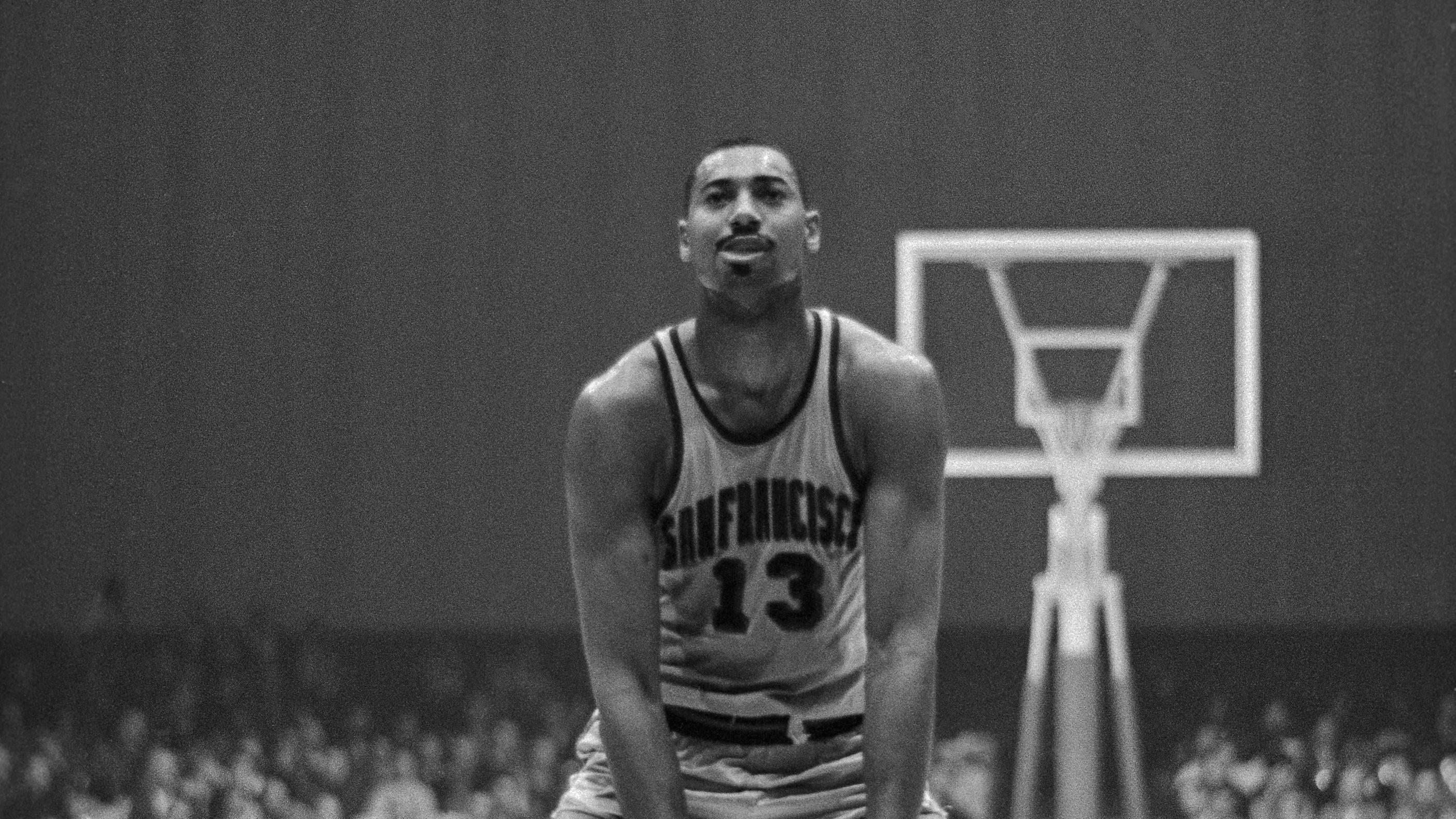 Wilt Chamberlain with Basketball Between Knees