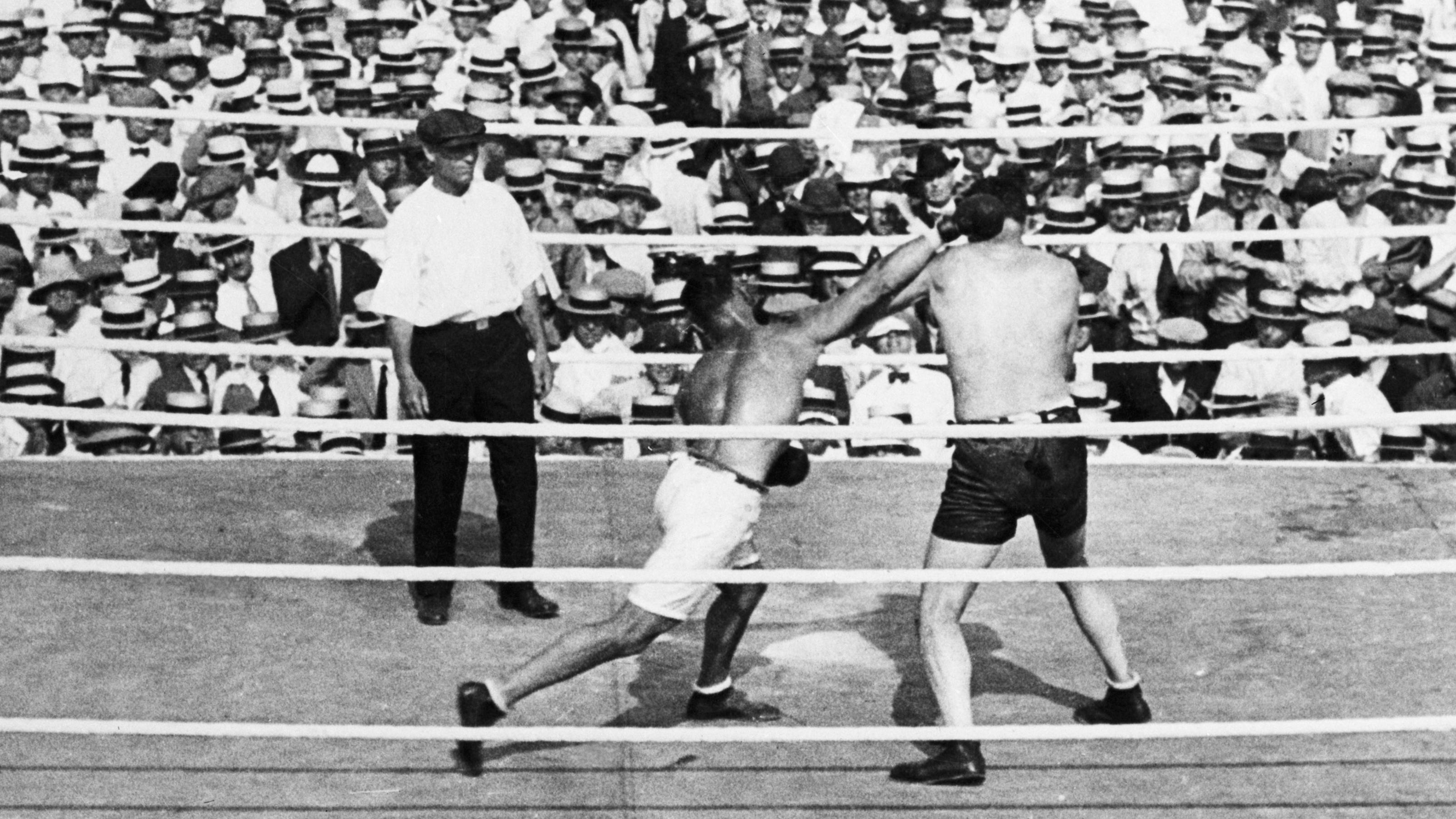 J. Dempsey Punching J. Willard W/Crowd