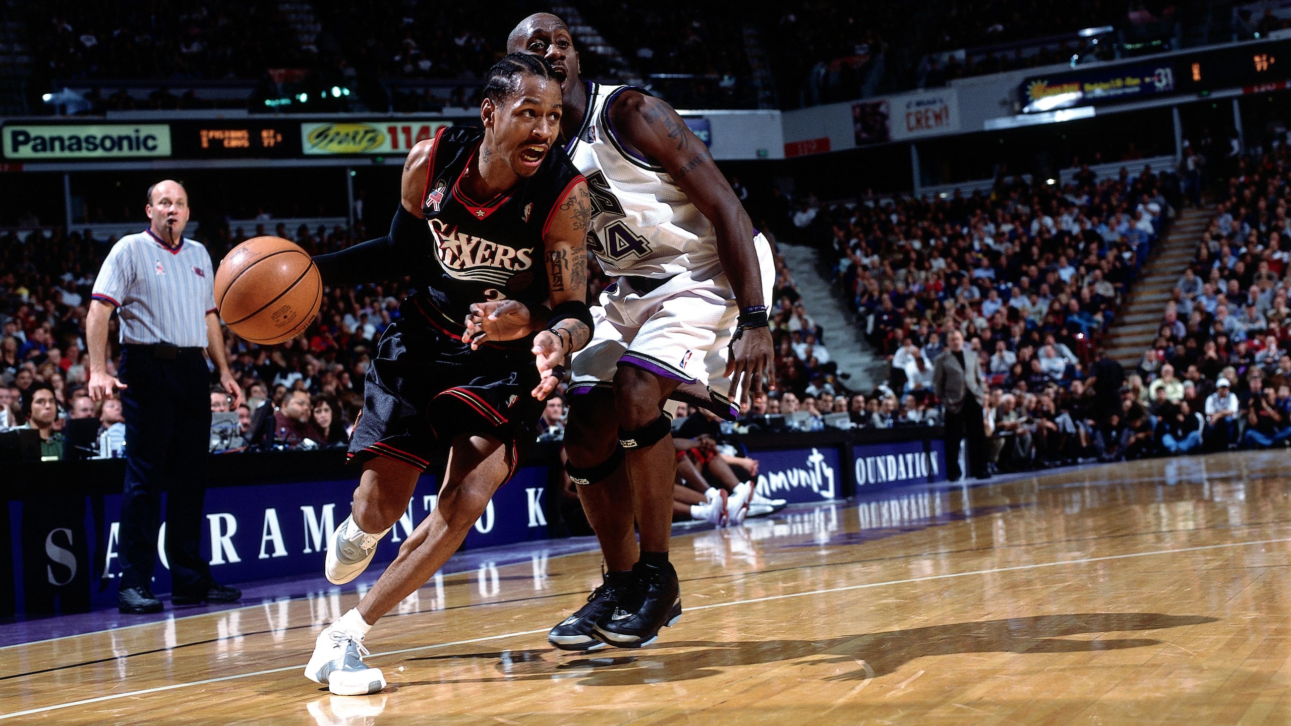 Iverson drives against the Kings