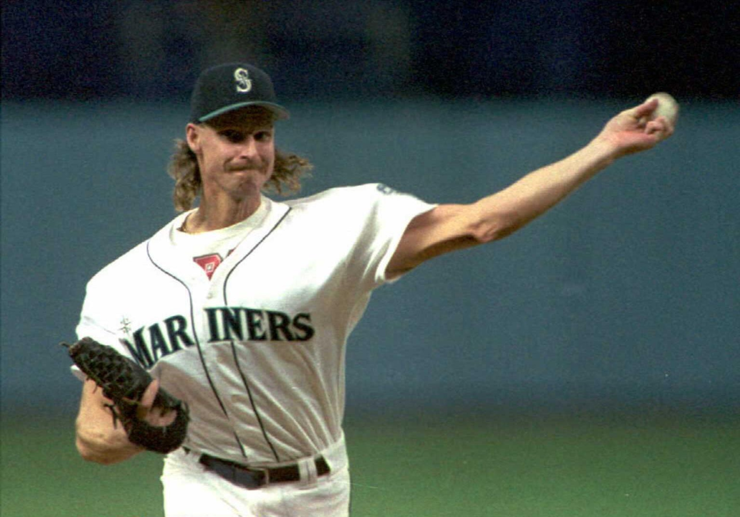 Seattles Mariners pitcher Randy Johnson hurls a pi