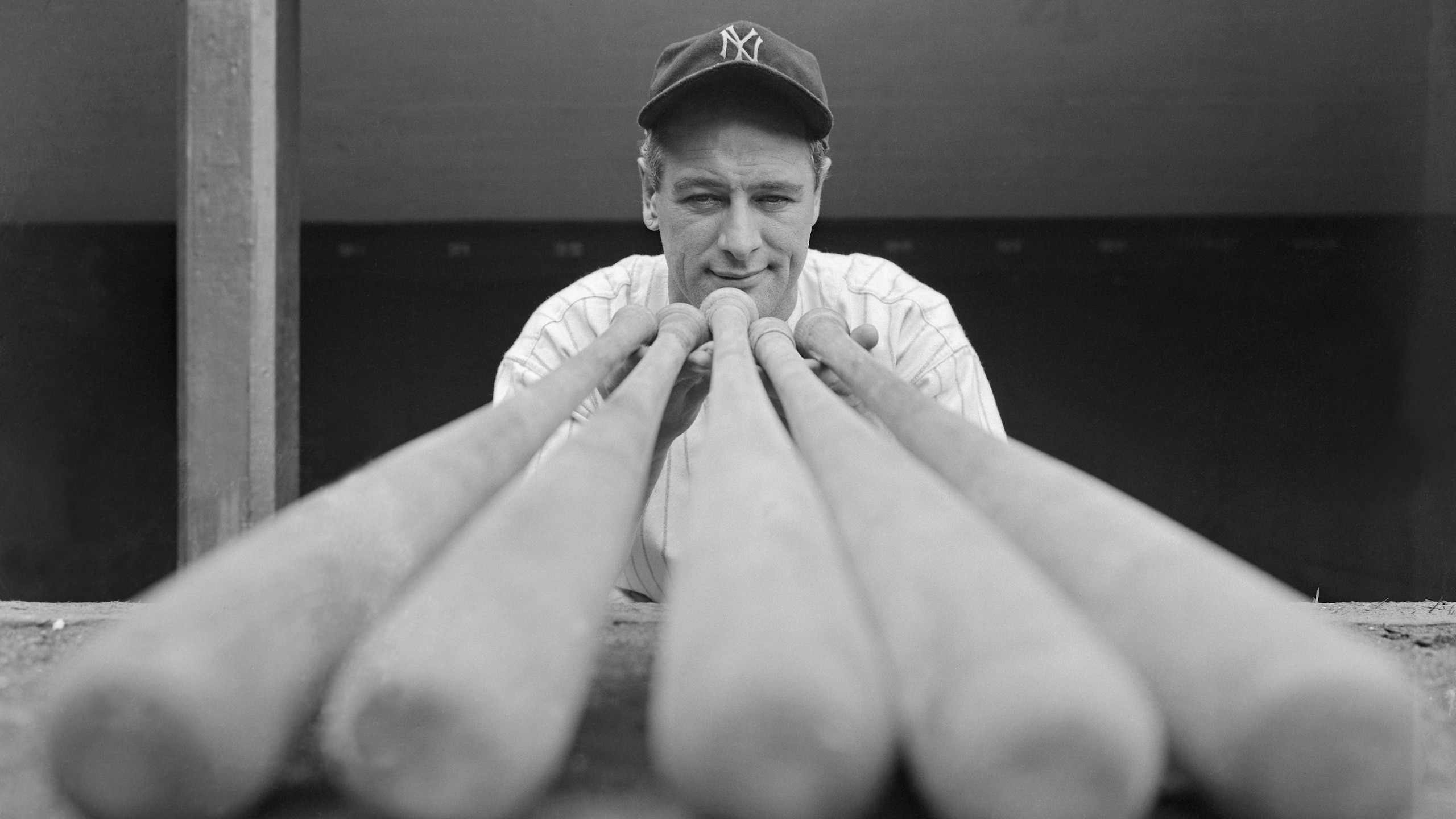 Lou Gehrig Examining Baseball Bats